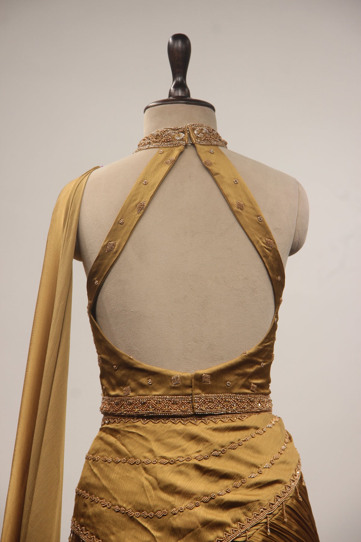 Gold Crepe Mermaid Lehenga with Bead & Cut Dana Handwork Drape Skirt