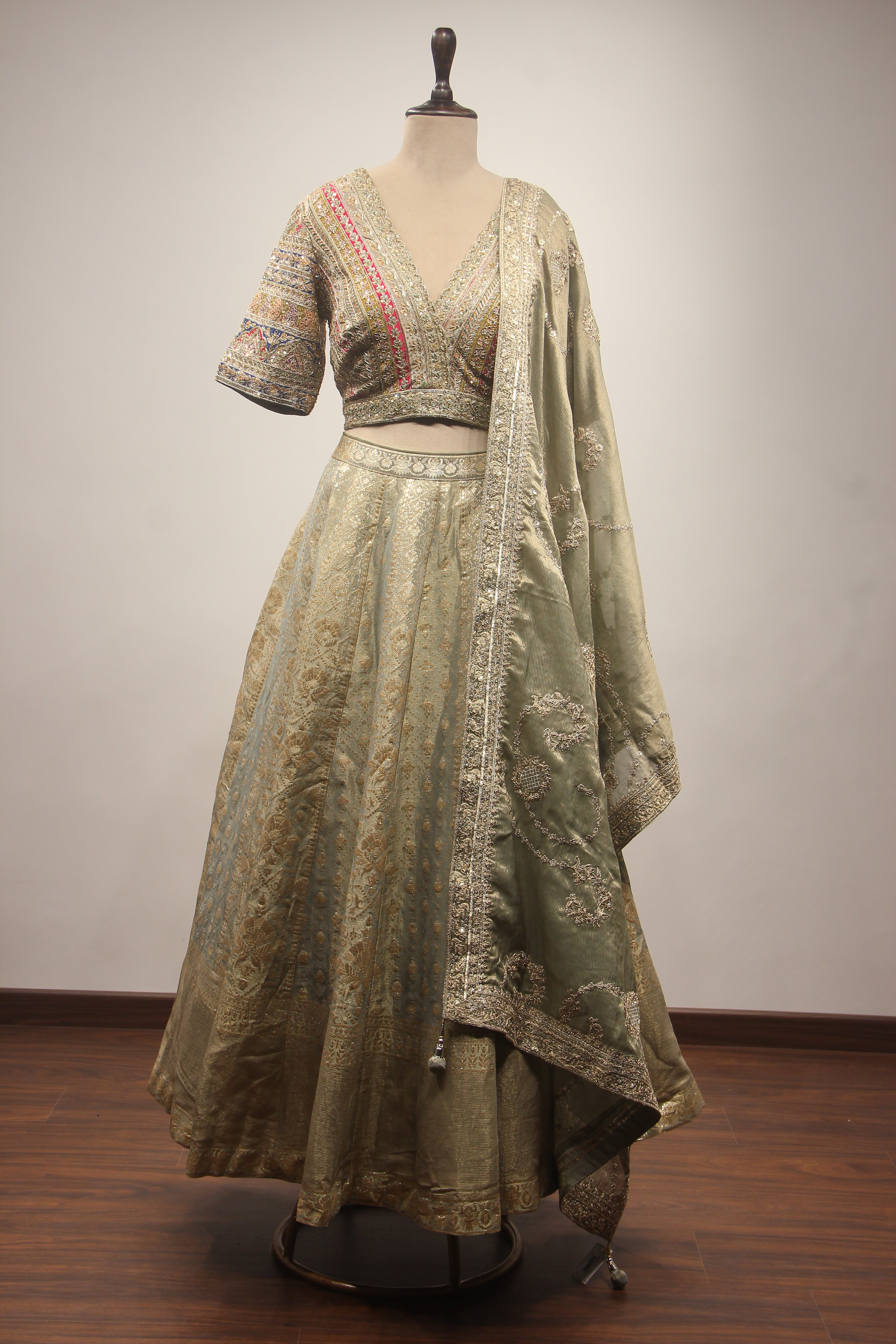 Olive Green Banarasi Brocade-Tissue Lehenga with Zardozi & Sequin Handwork Crop Top