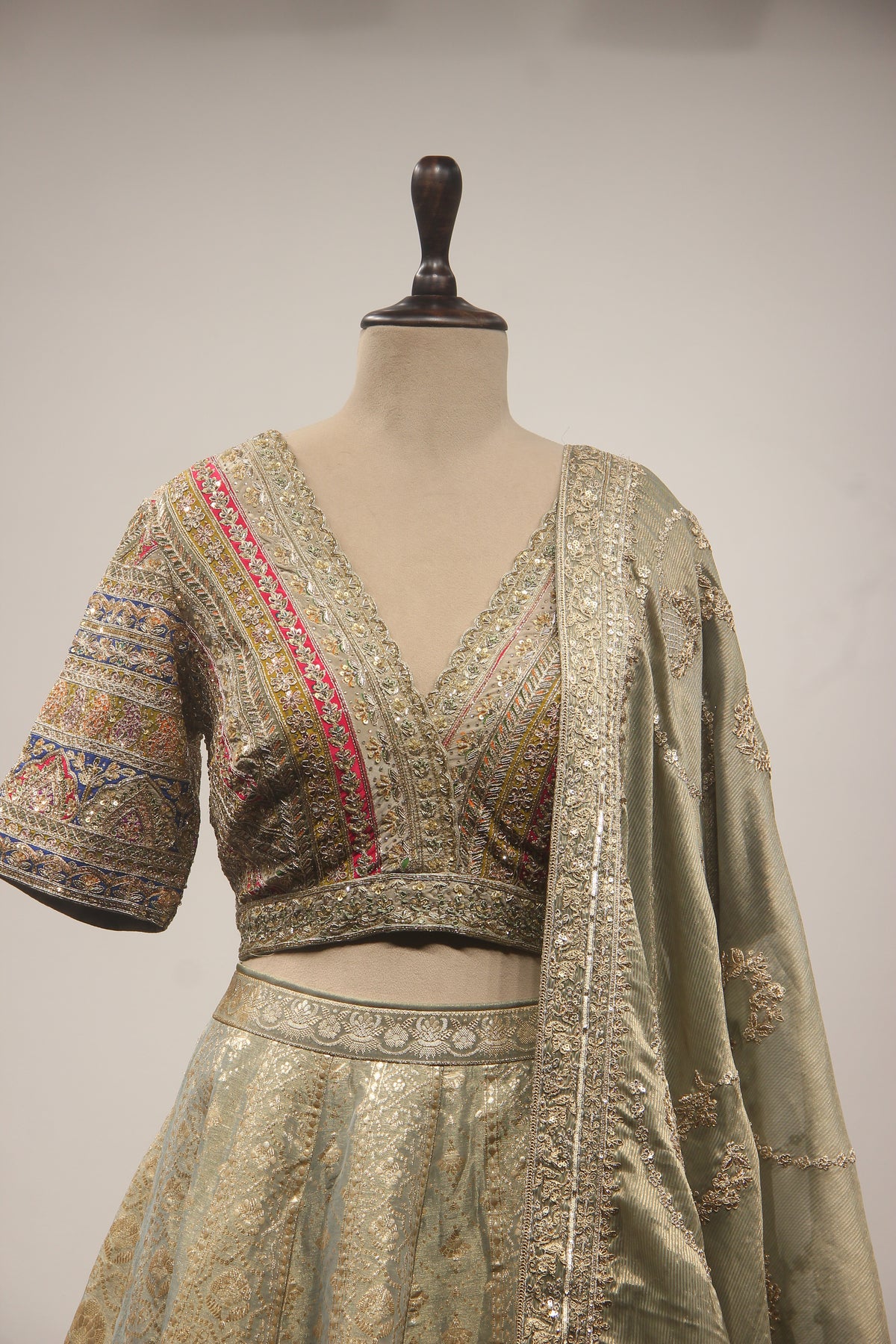 Olive Green Banarasi Brocade-Tissue Lehenga with Zardozi & Sequin Handwork Crop Top