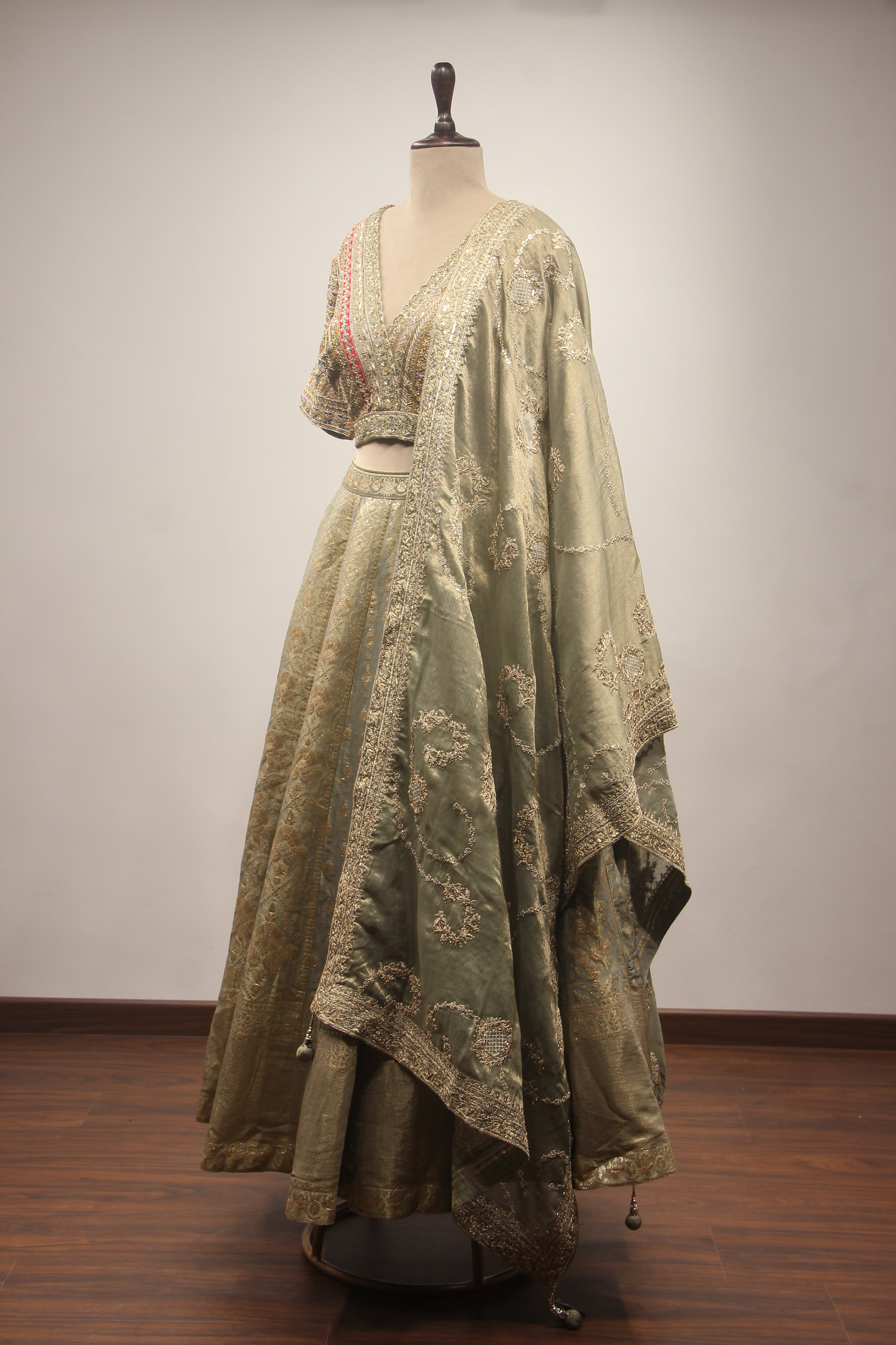 Olive Green Banarasi Brocade-Tissue Lehenga with Zardozi & Sequin Handwork Crop Top