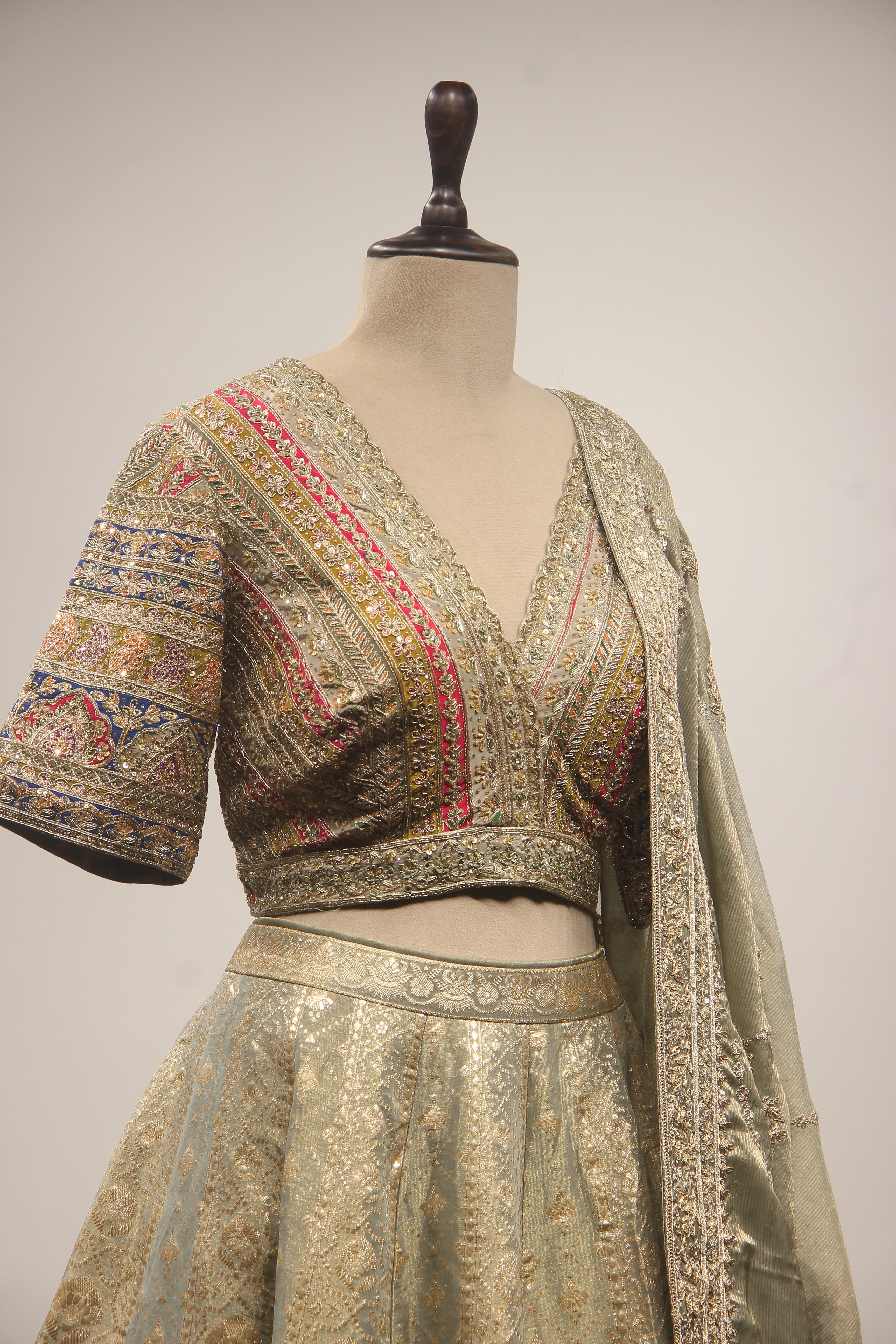 Olive Green Banarasi Brocade-Tissue Lehenga with Zardozi & Sequin Handwork Crop Top
