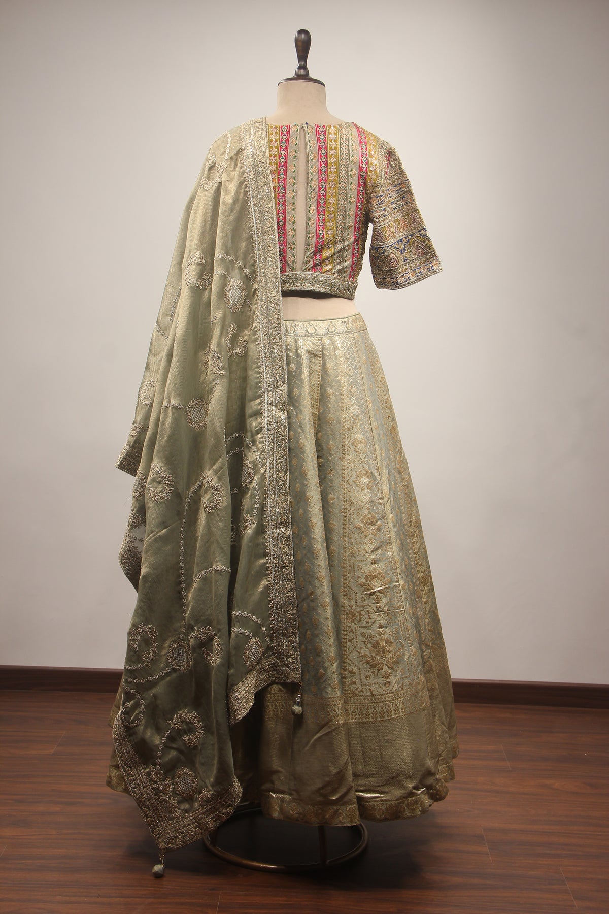 Olive Green Banarasi Brocade-Tissue Lehenga with Zardozi & Sequin Handwork Crop Top