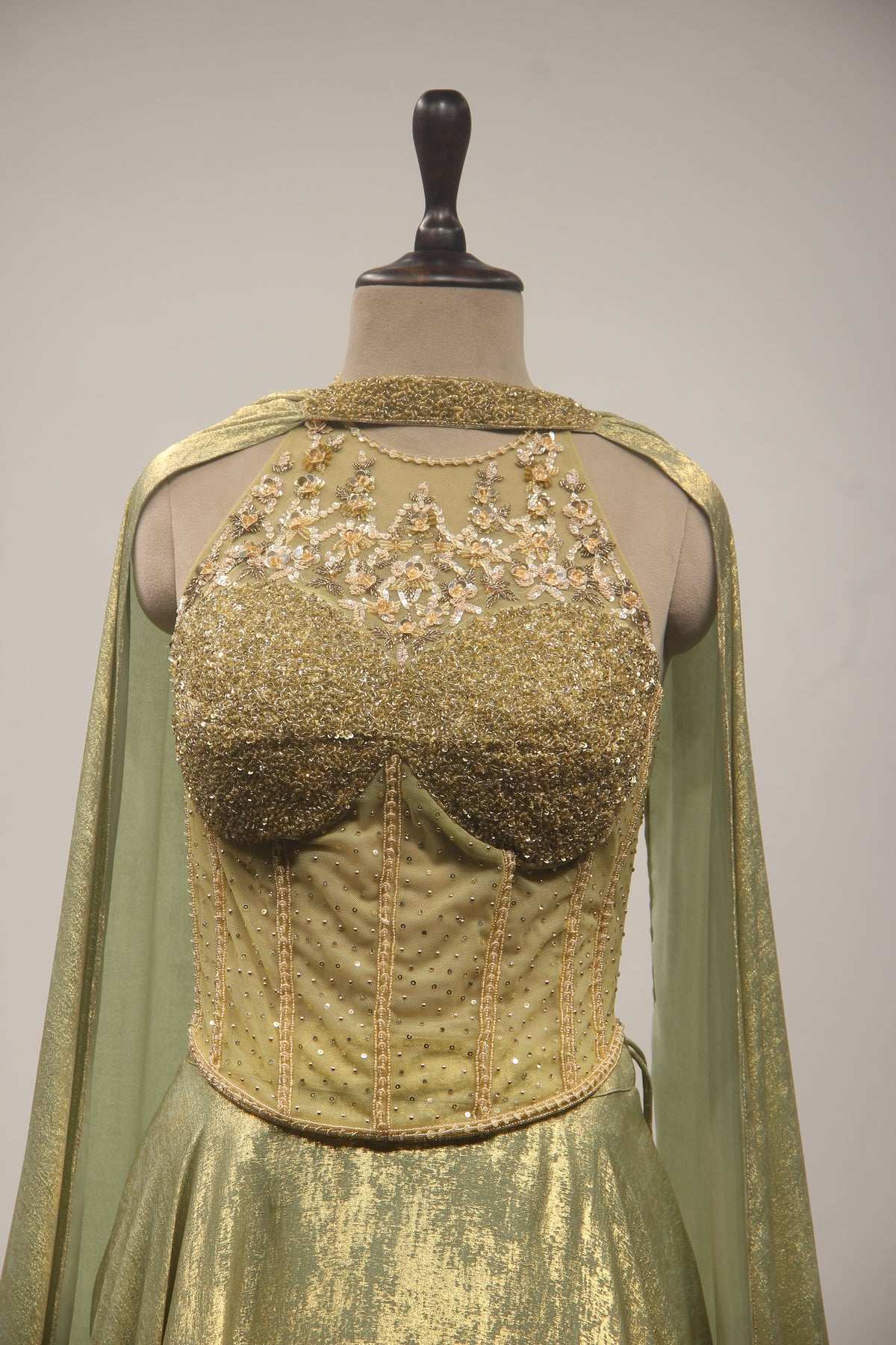 Simmer Lehenga with Halter Corset Blouse & Cut Dana Handwork