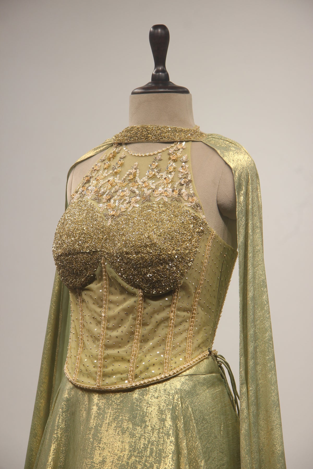 Simmer Lehenga with Halter Corset Blouse & Cut Dana Handwork