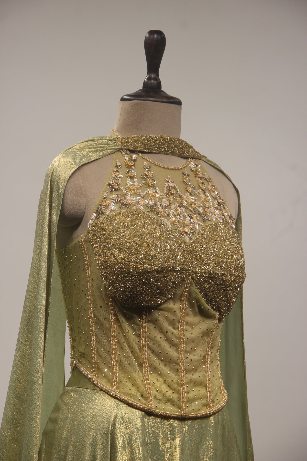 Simmer Lehenga with Halter Corset Blouse & Cut Dana Handwork