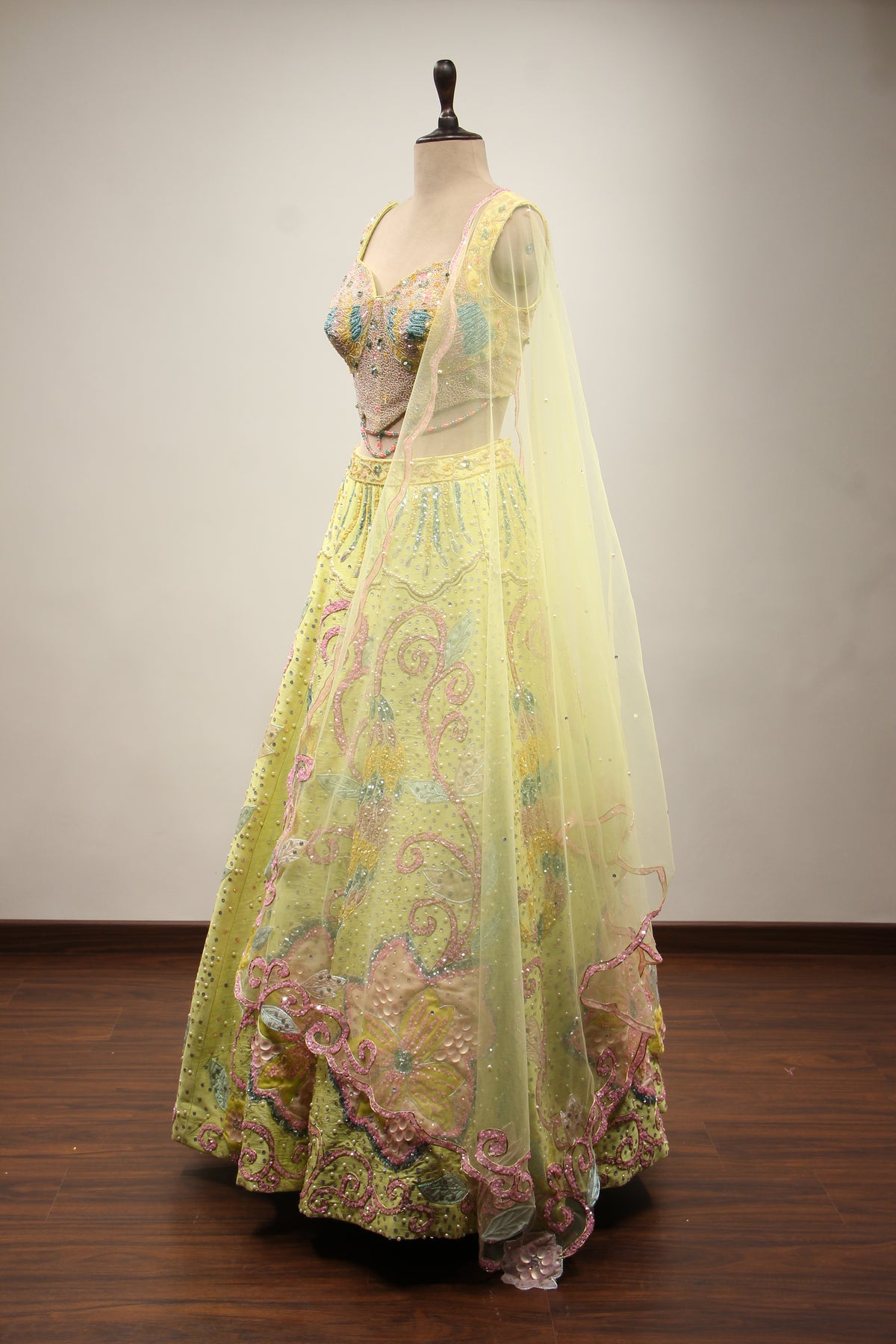 Pista Green Dupion Lehenga with Mirror & Cut Dana Handwork Net Corset – side view