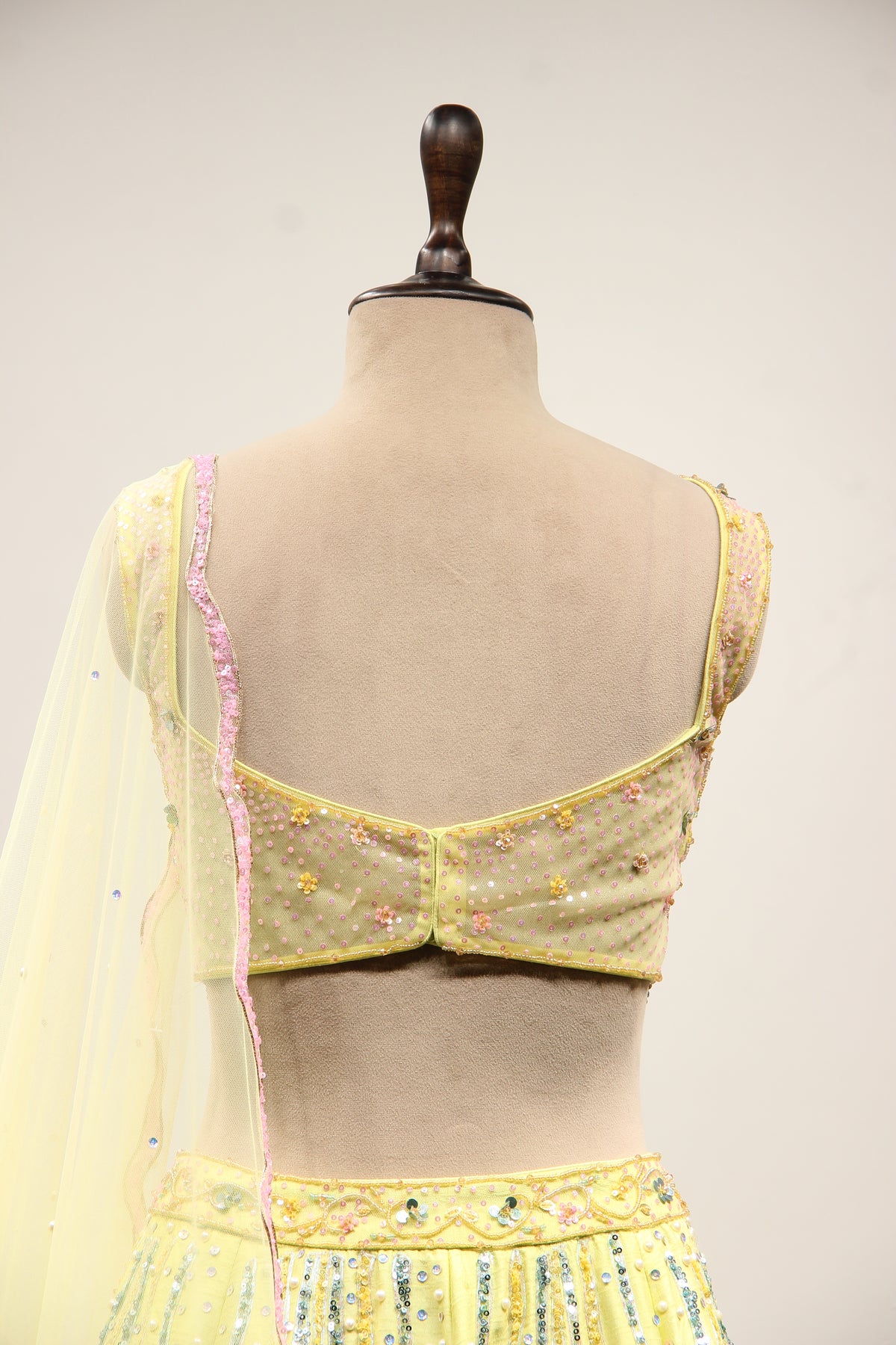 Pista Green Dupion Lehenga with Mirror & Cut Dana Handwork Net Corset – back close-up