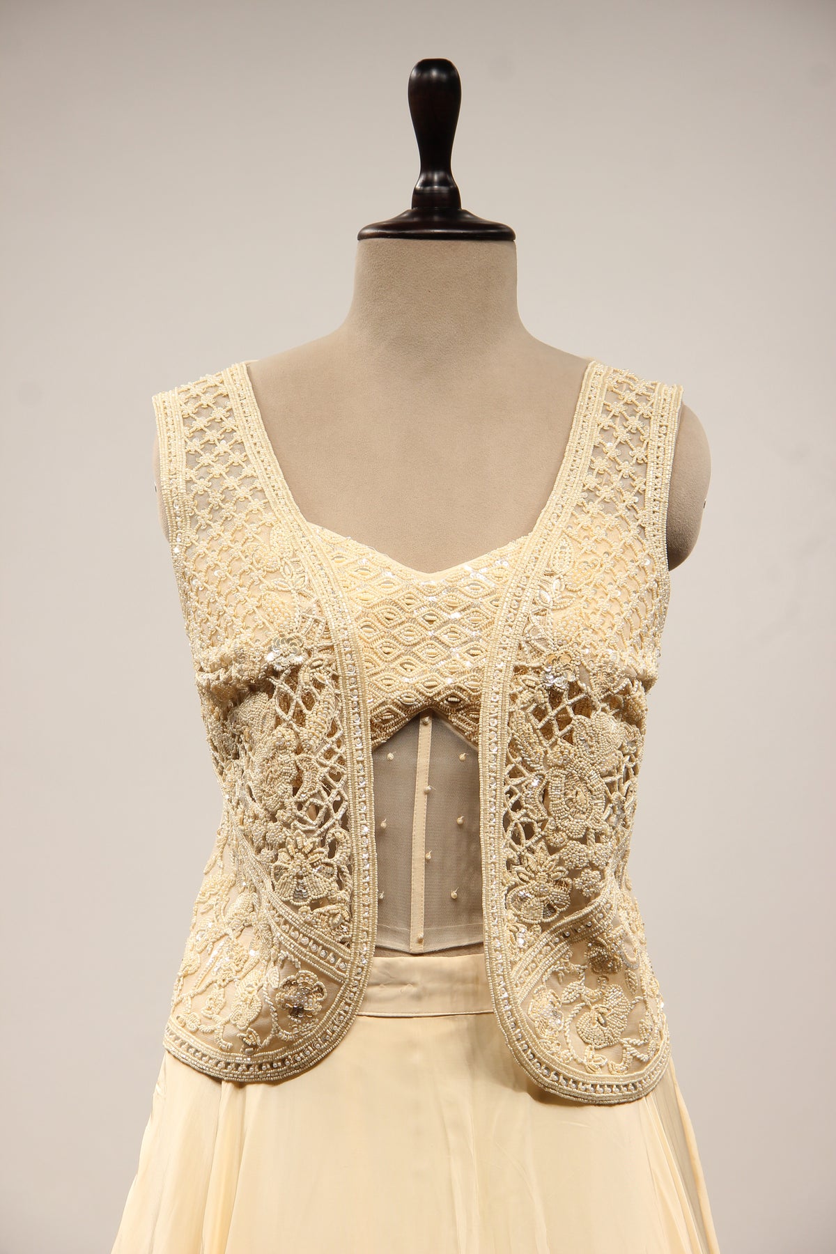 Cream Crepe Lehenga with Bead & Sequin Handwork Corset Jacket