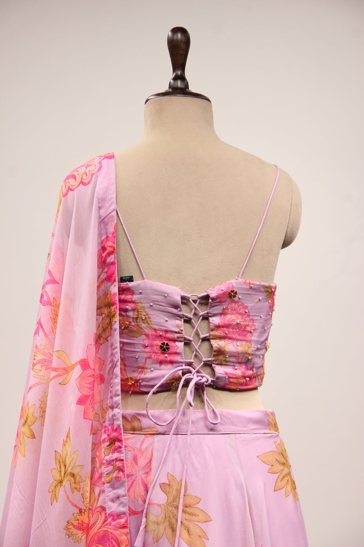 Lavender Organza Lehenga with Printed & Cut Dana Handwork Corset