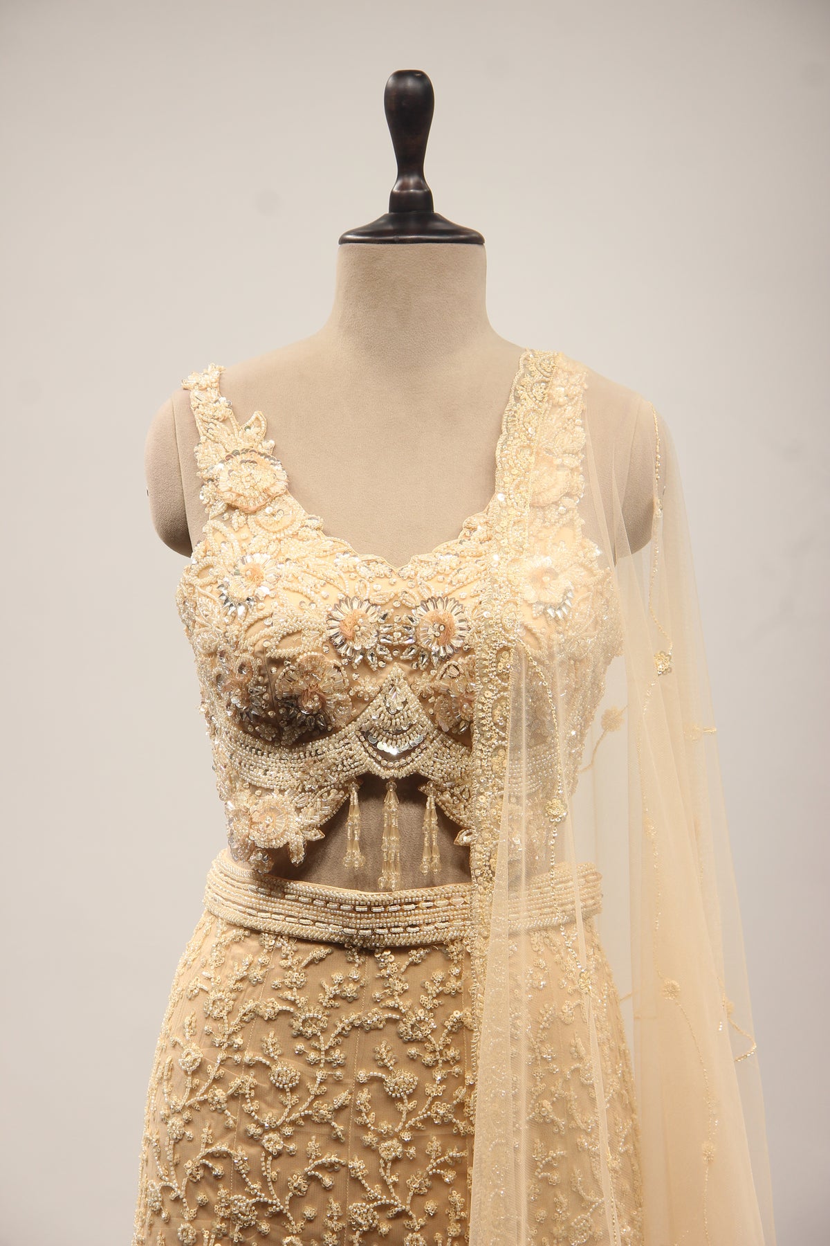 Net Mermaid Lehenga with Sequin & Cut Dana Handwork and Floral Bodice in Gold – front close-up