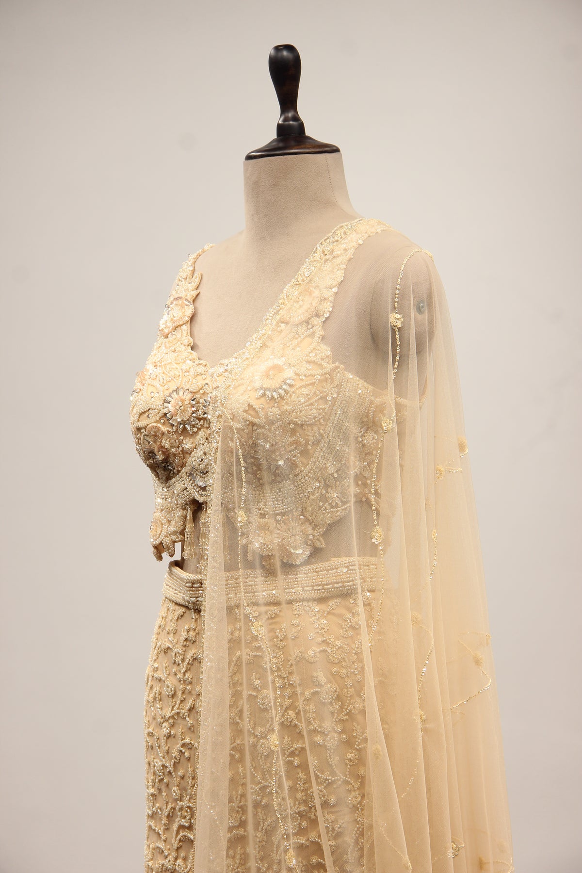 Net Mermaid Lehenga with Sequin & Cut Dana Handwork and Floral Bodice in Gold – side close-up