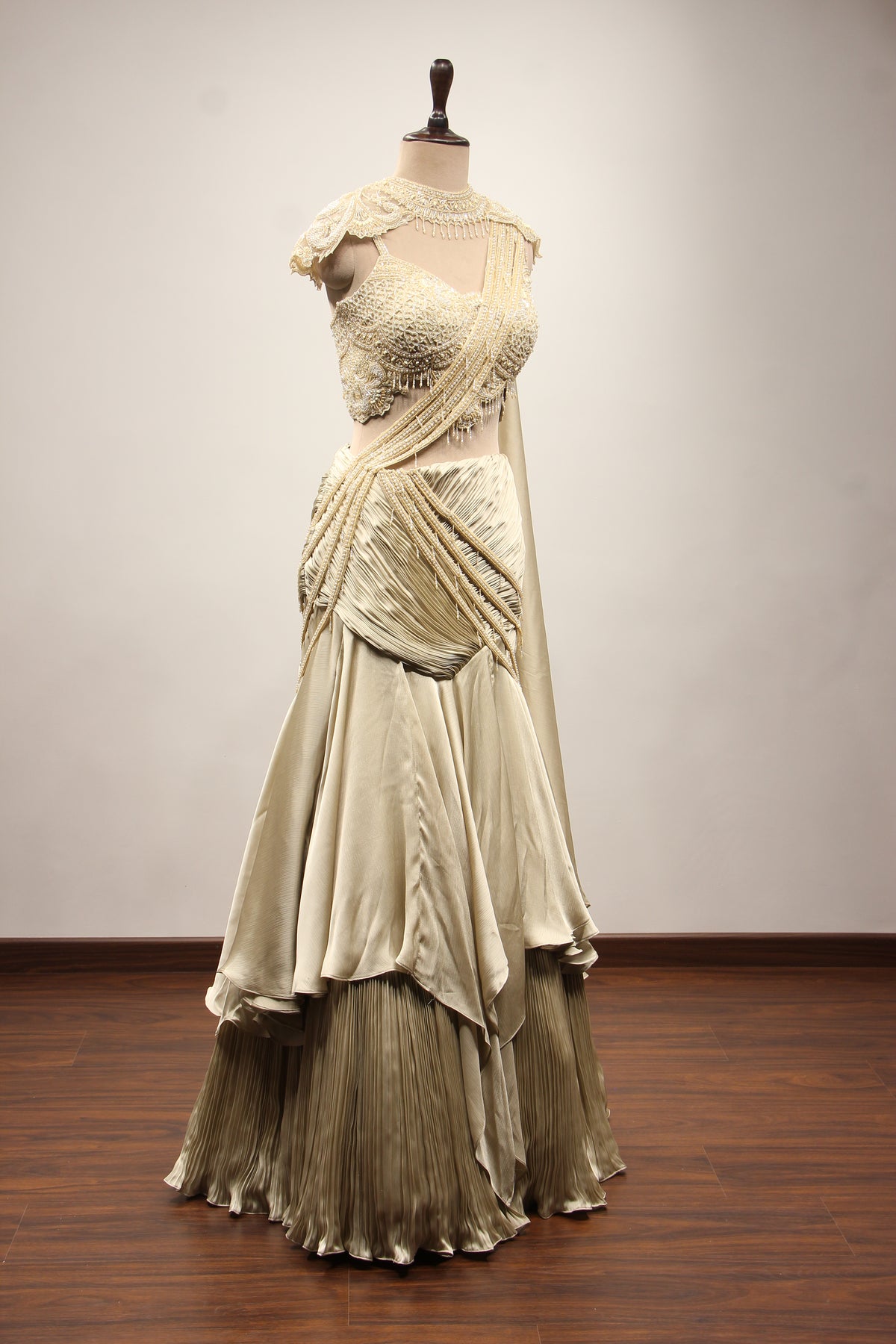 Ivory Satin Drape Skirt Lehenga with Bead & Pearl Handwork Crop Top – other side view, with cape
