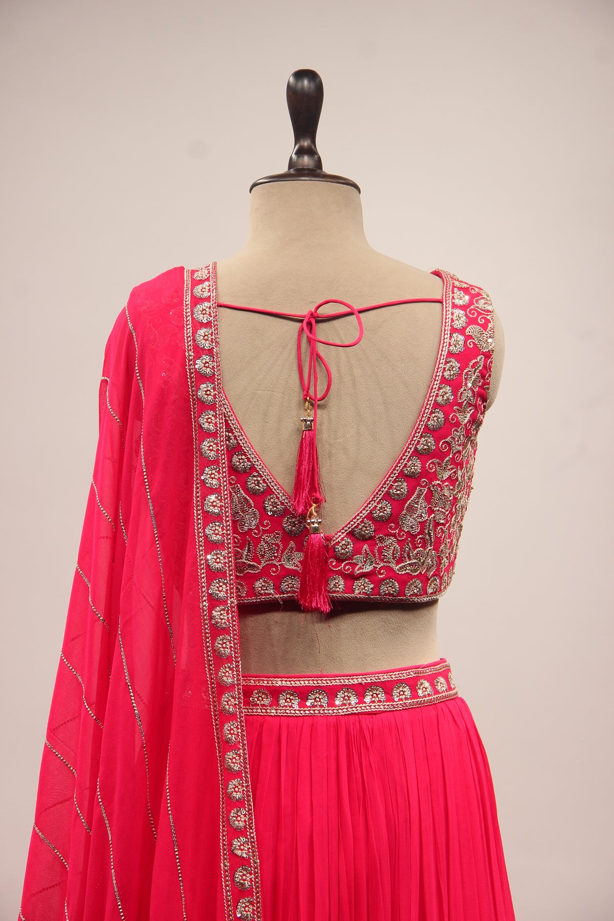Orange Georgette Lehenga with Resham & Zari Handwork Crop Top in Pink – back close-up