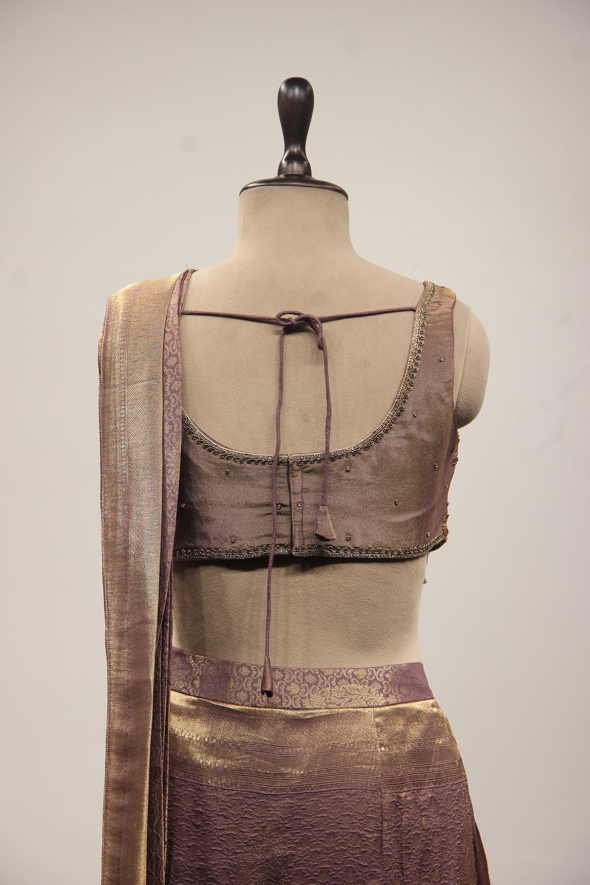 Banarasi Brocade Drape Saree with Zardozi & Cut Dana Handwork Corset in Purple – back close-up