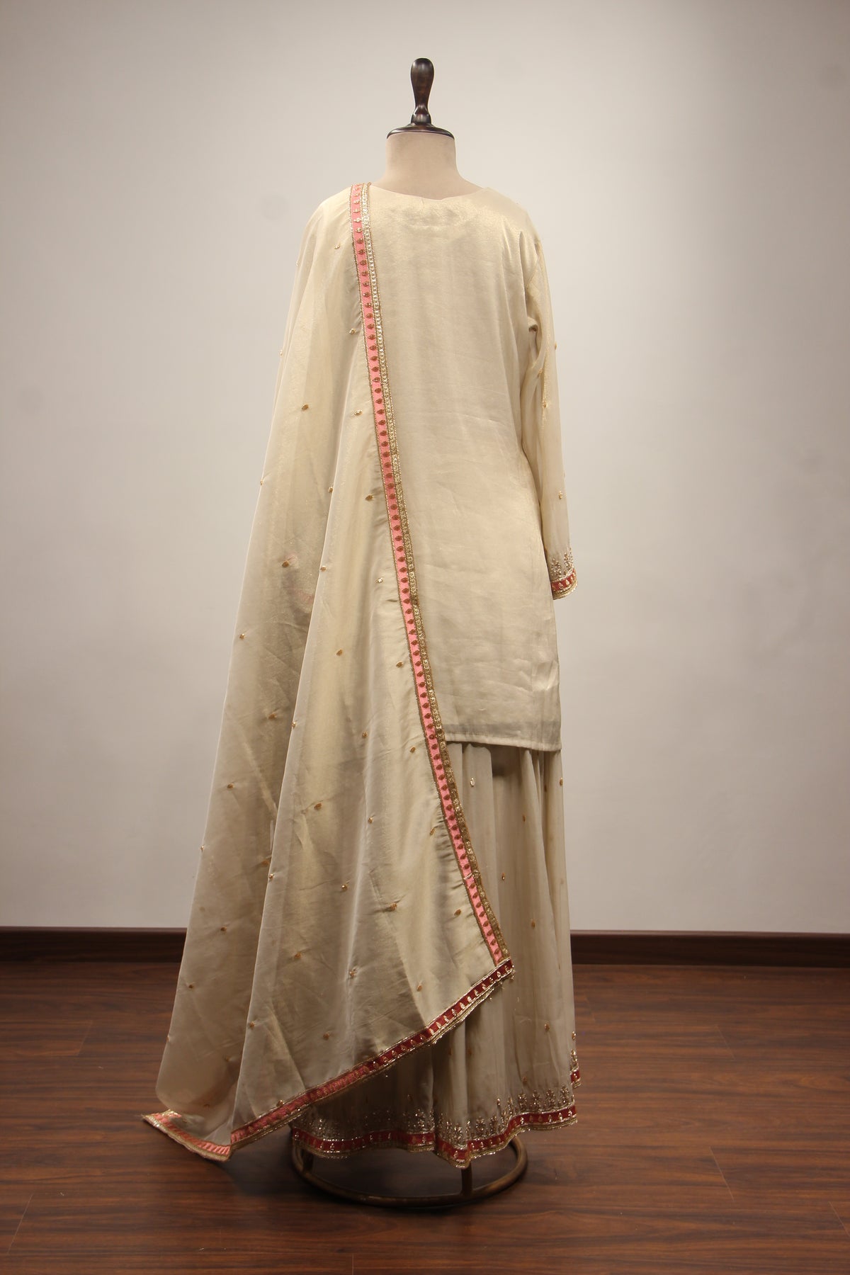 Cream Tissue Sharara Suit with Zari & Zardozi Handwork and Pink Border – back view