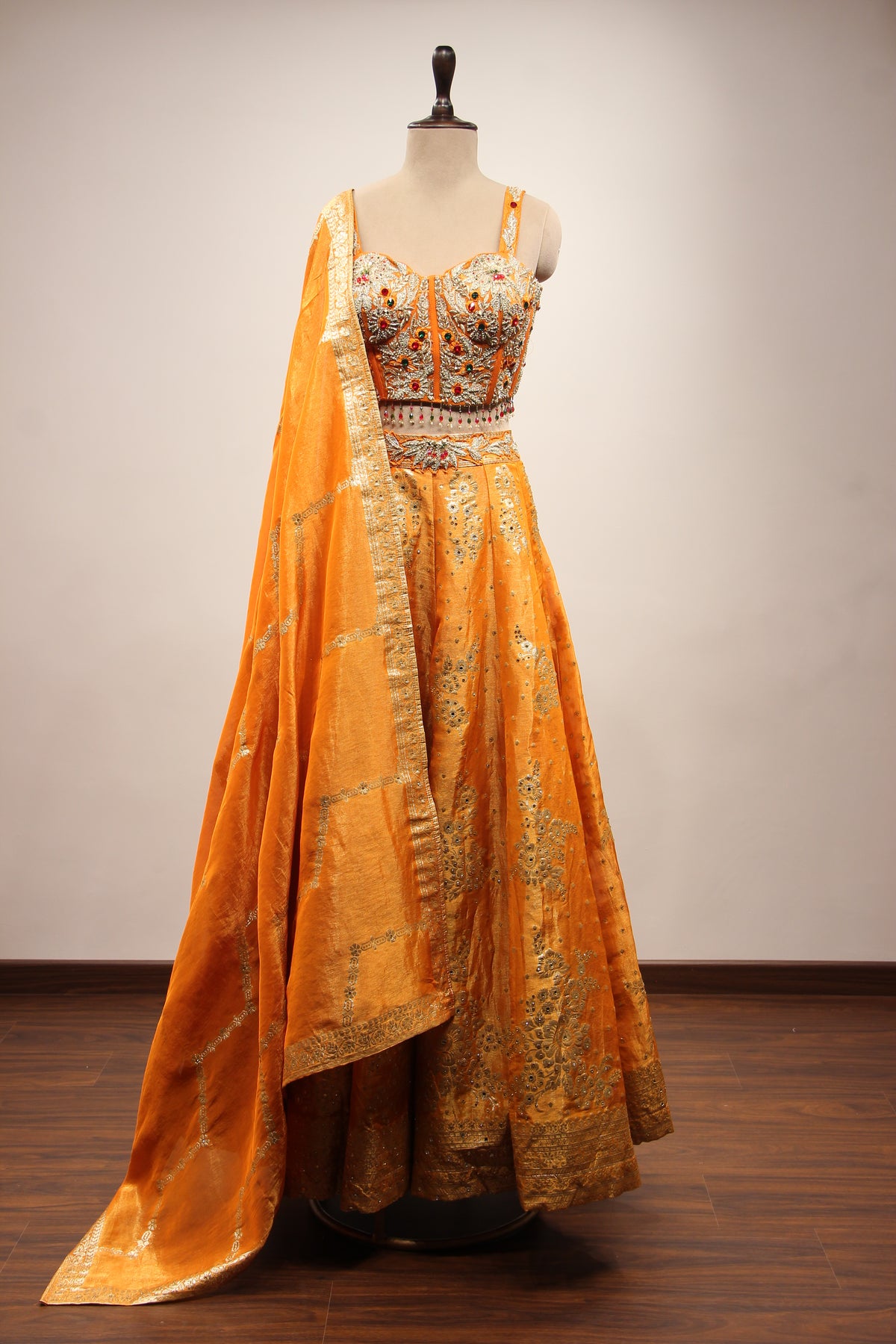 Tissue Lehenga with Stone & Zari Handwork Corset Blouse in Orange – front view