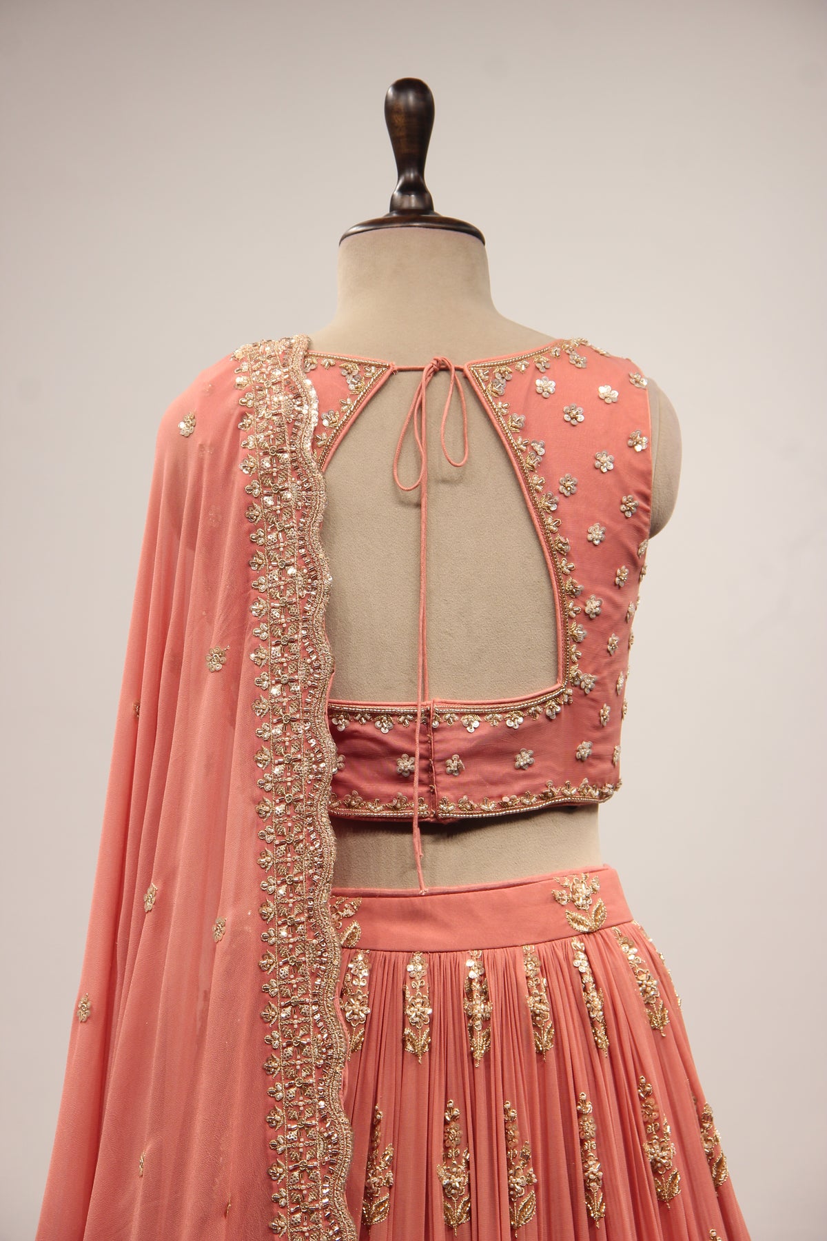 Peach Georgette Lehenga with Embroidery & Cut Dana Handwork Crop Top