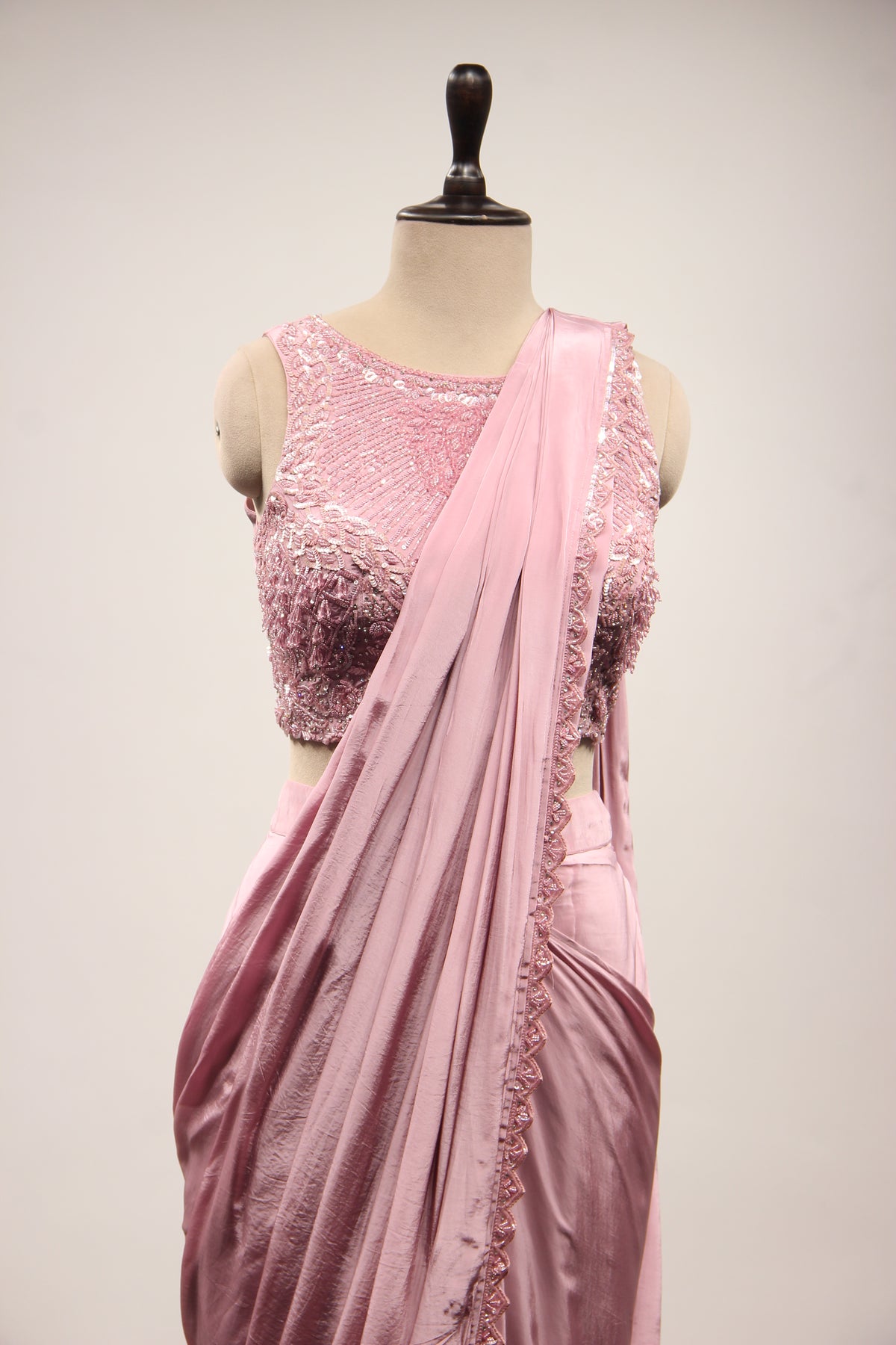 Crepe Drape Saree with Cut Dana & Sequin Handwork, Net Corset Blouse in Pink – front close-up