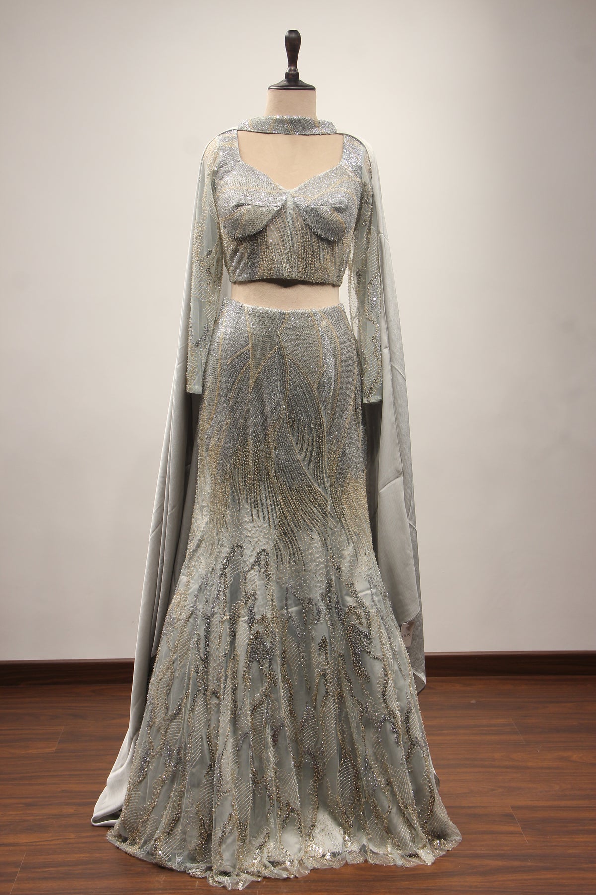 Grey Net Mermaid Lehenga with Cut Dana & Sequin Handwork Bustier – front view