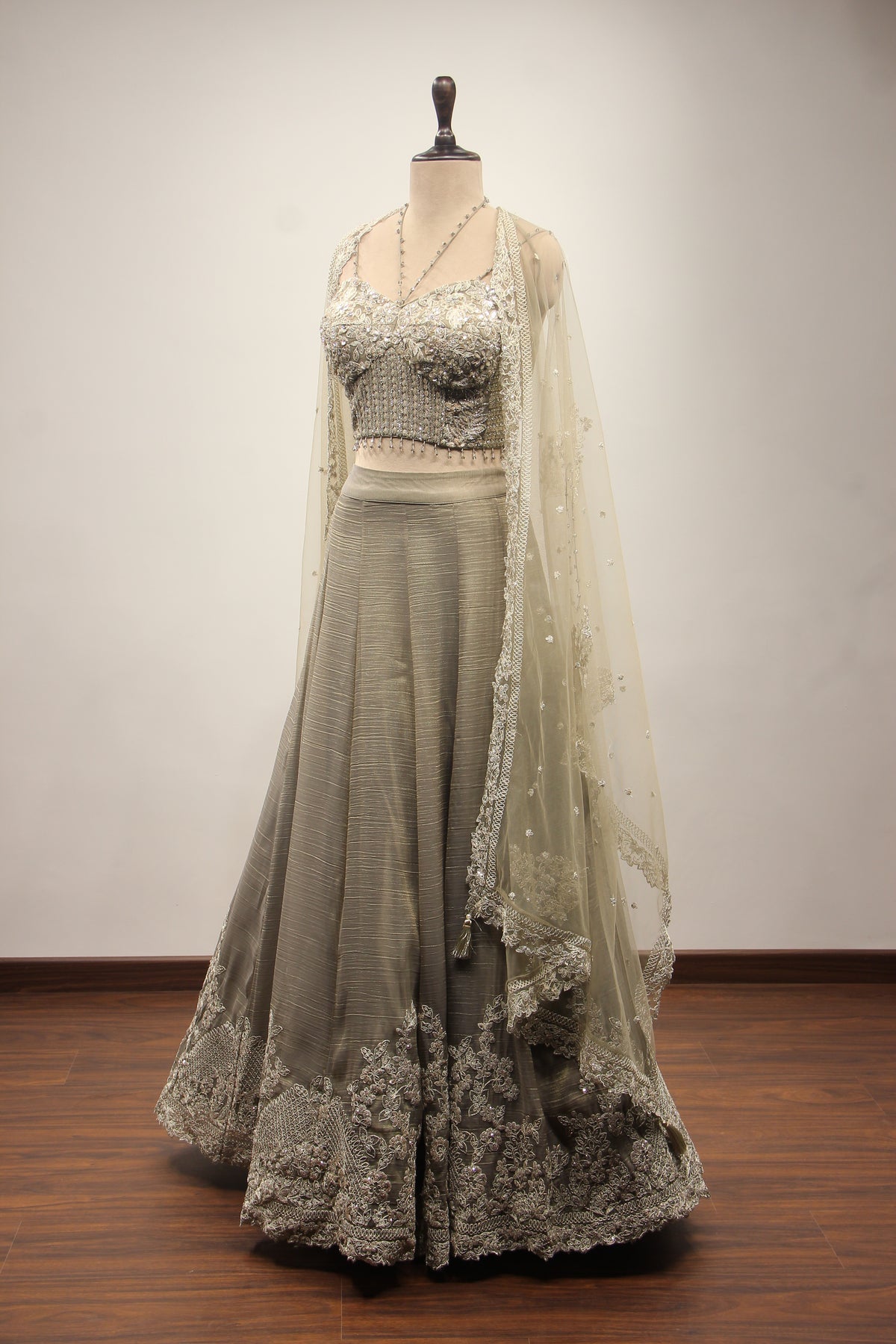 Grey Tissue Corset Lehenga with Sequin & Stone Handwork and Net Shrug – side view, with shrug