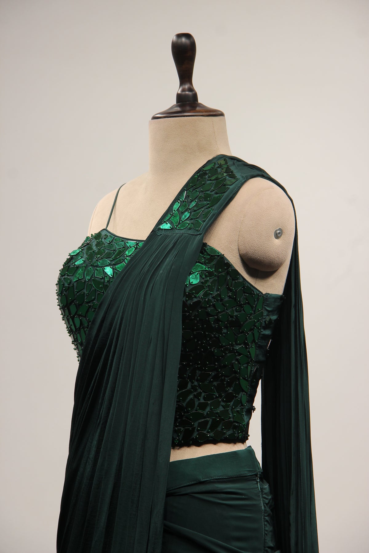 Bottle Green Crepe Drape Saree with Mirror & Bead Handwork Corset – side close-up