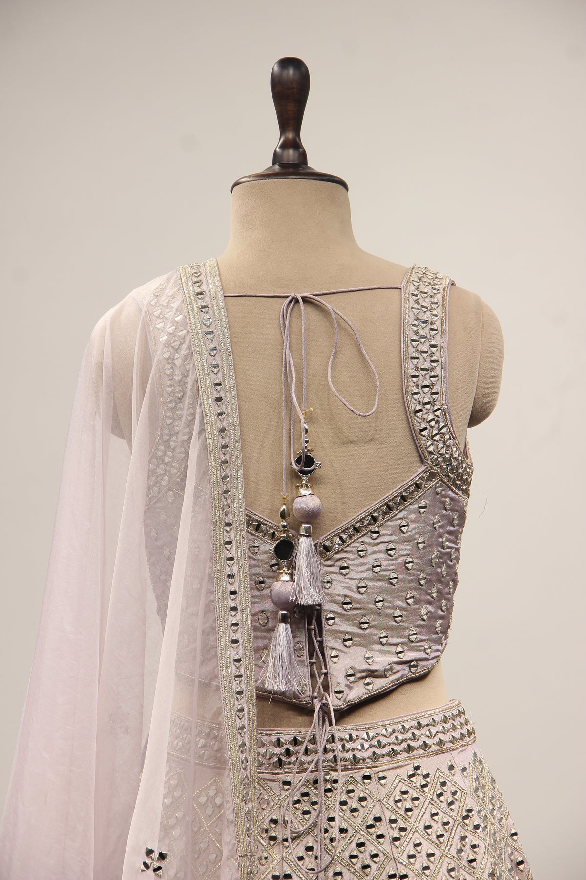 Lilac Shimmer Tissue Corset Lehenga with Mirror & Sequin Handwork – back close-up