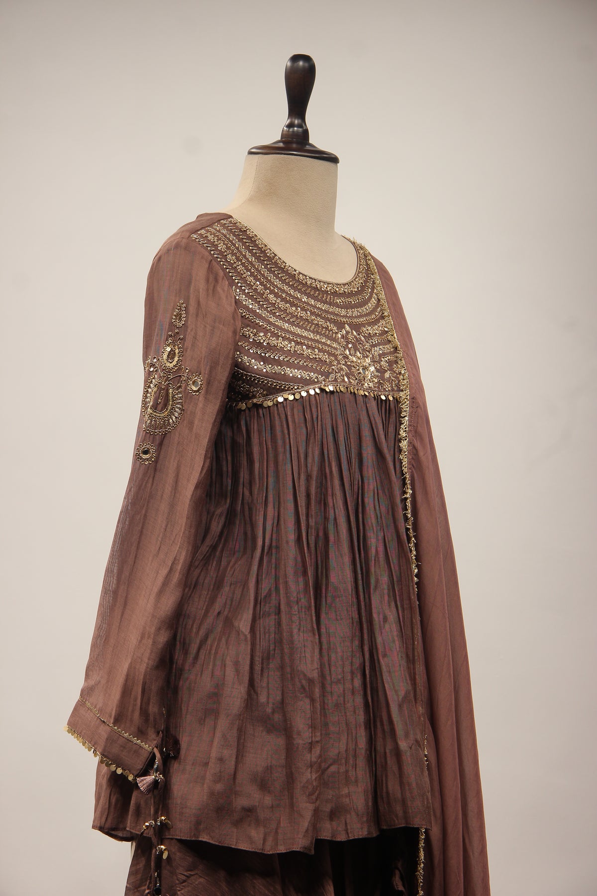 Chanderi Peplum Sharara Suit with Sequin & Zari Handwork Yoke in Brown – other side close-up