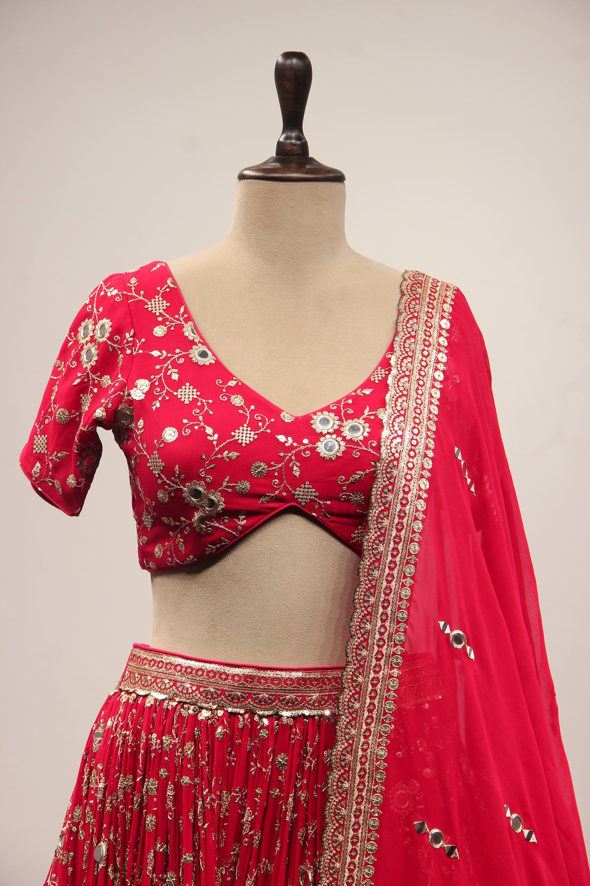 Georgette Lehenga with Mirror & Sequin Handwork Twist Front Crop Top in Red – front close-up