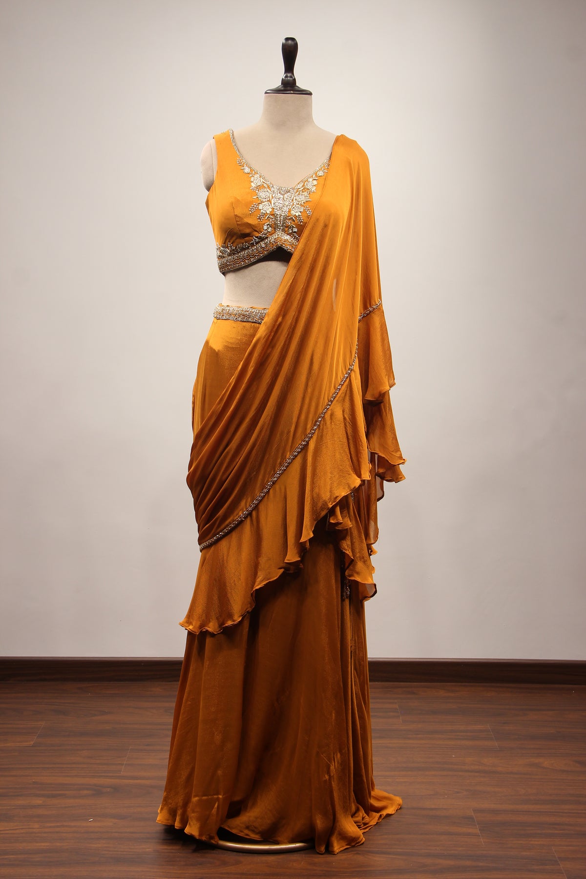 Crepe Ruffle Drape Saree with Zardozi & Bead Handwork V-Neck Crop Top in Yellow – front view