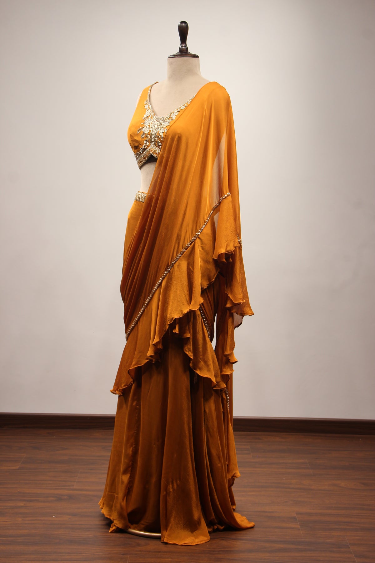 Crepe Ruffle Drape Saree with Zardozi & Bead Handwork V-Neck Crop Top in Yellow – side view