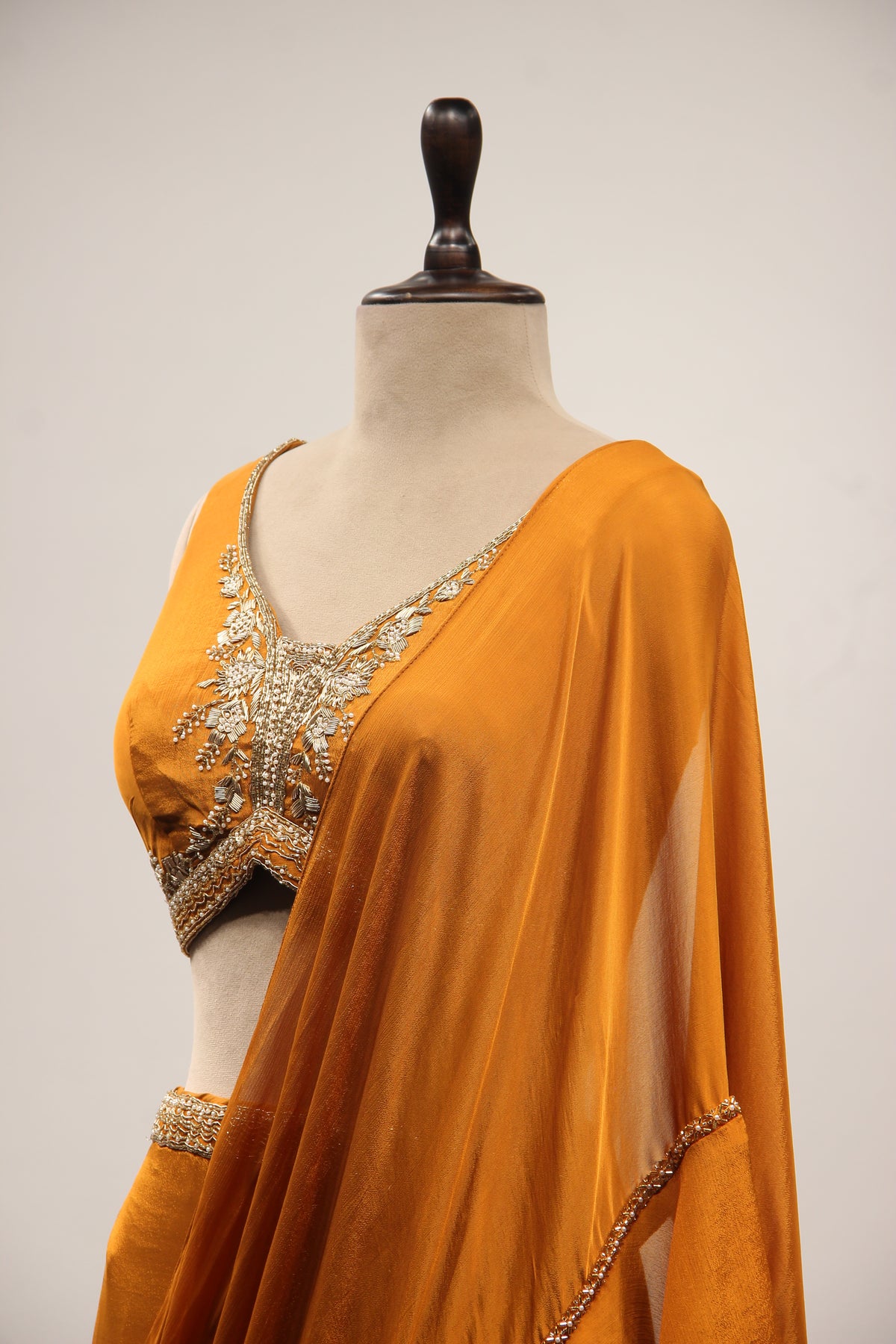 Crepe Ruffle Drape Saree with Zardozi & Bead Handwork V-Neck Crop Top in Yellow – side close-up