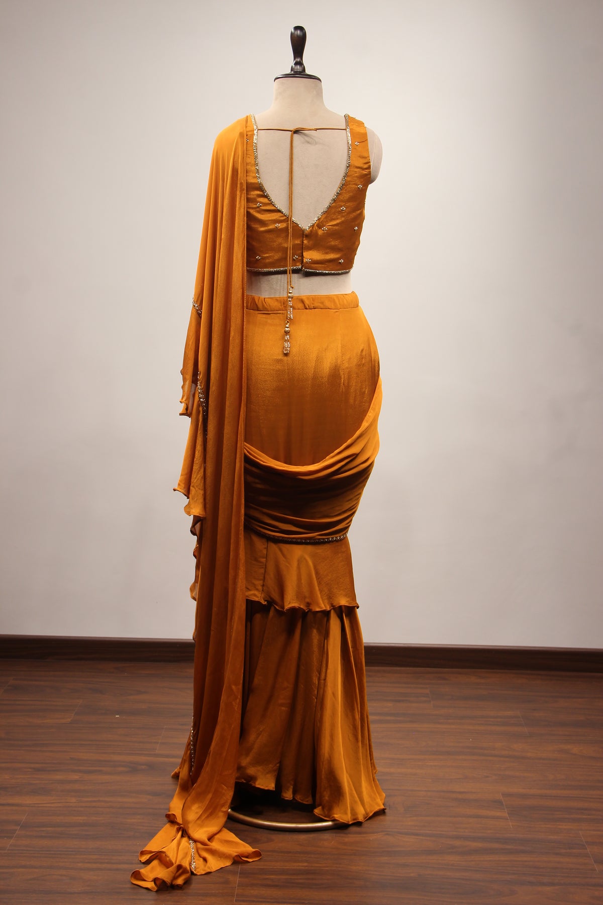 Crepe Ruffle Drape Saree with Zardozi & Bead Handwork V-Neck Crop Top in Yellow – back view