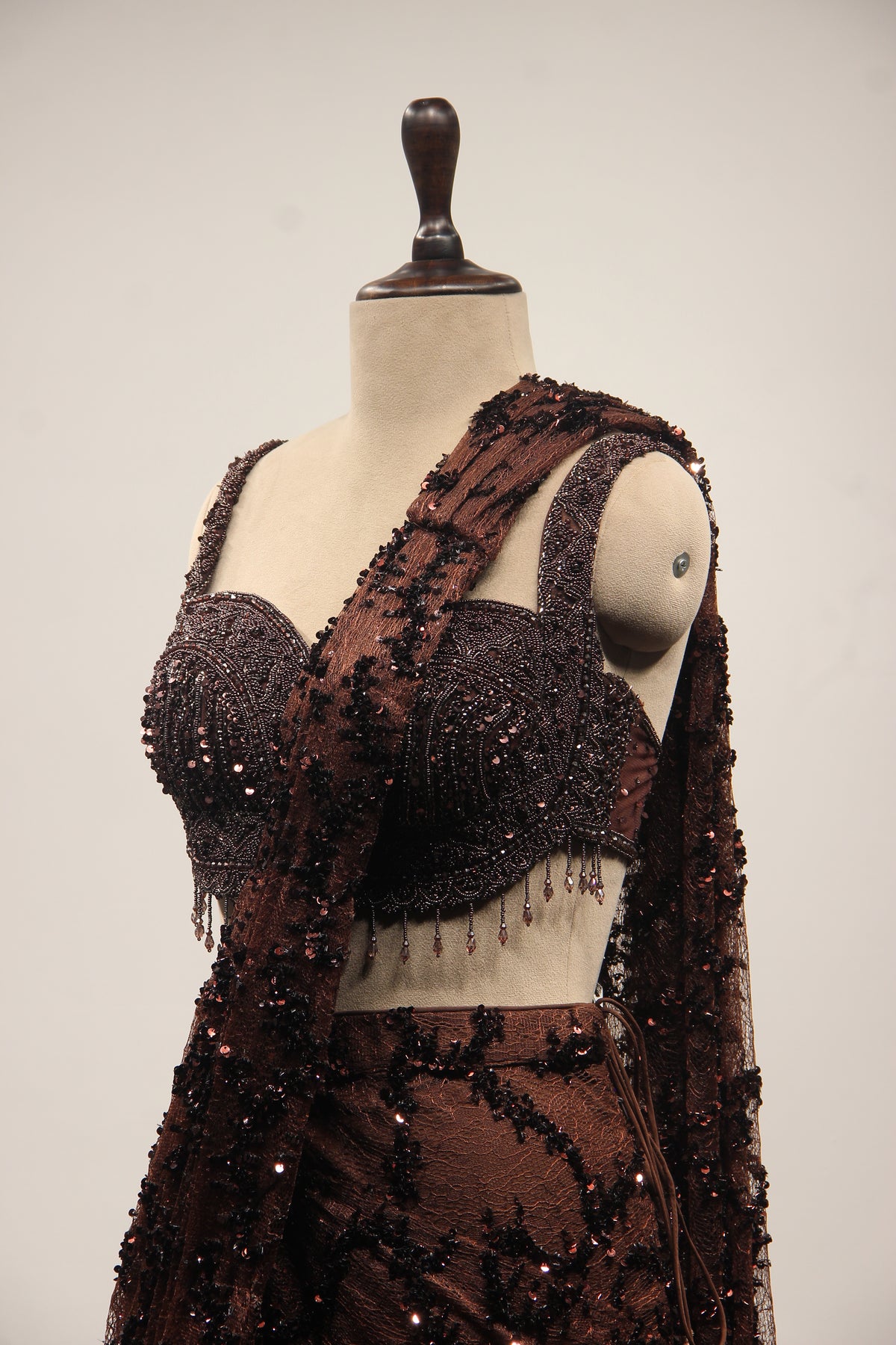 Brown Imported Drape Saree with Bead & Cut Dana Handwork Net Corset – other side close-up