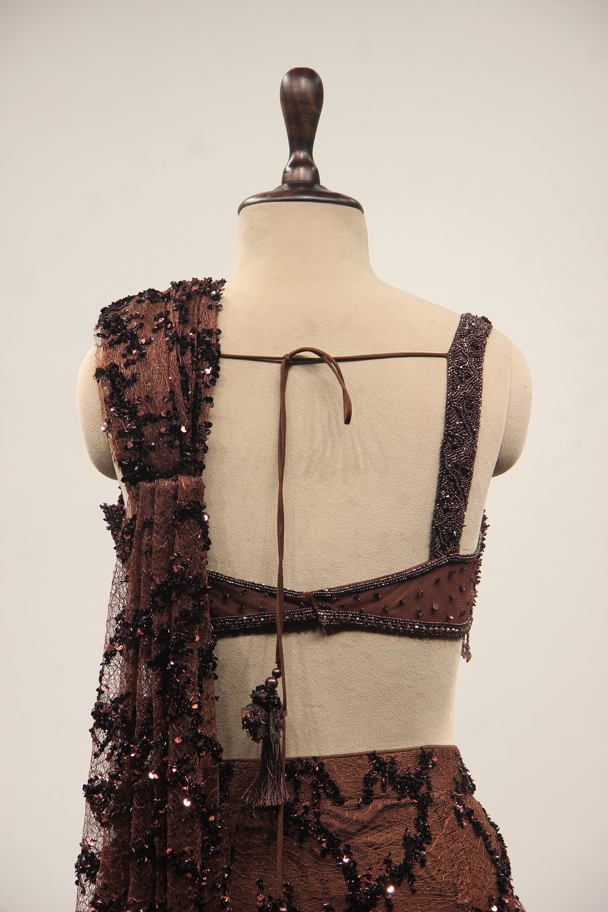 Brown Imported Drape Saree with Bead & Cut Dana Handwork Net Corset – back close-up