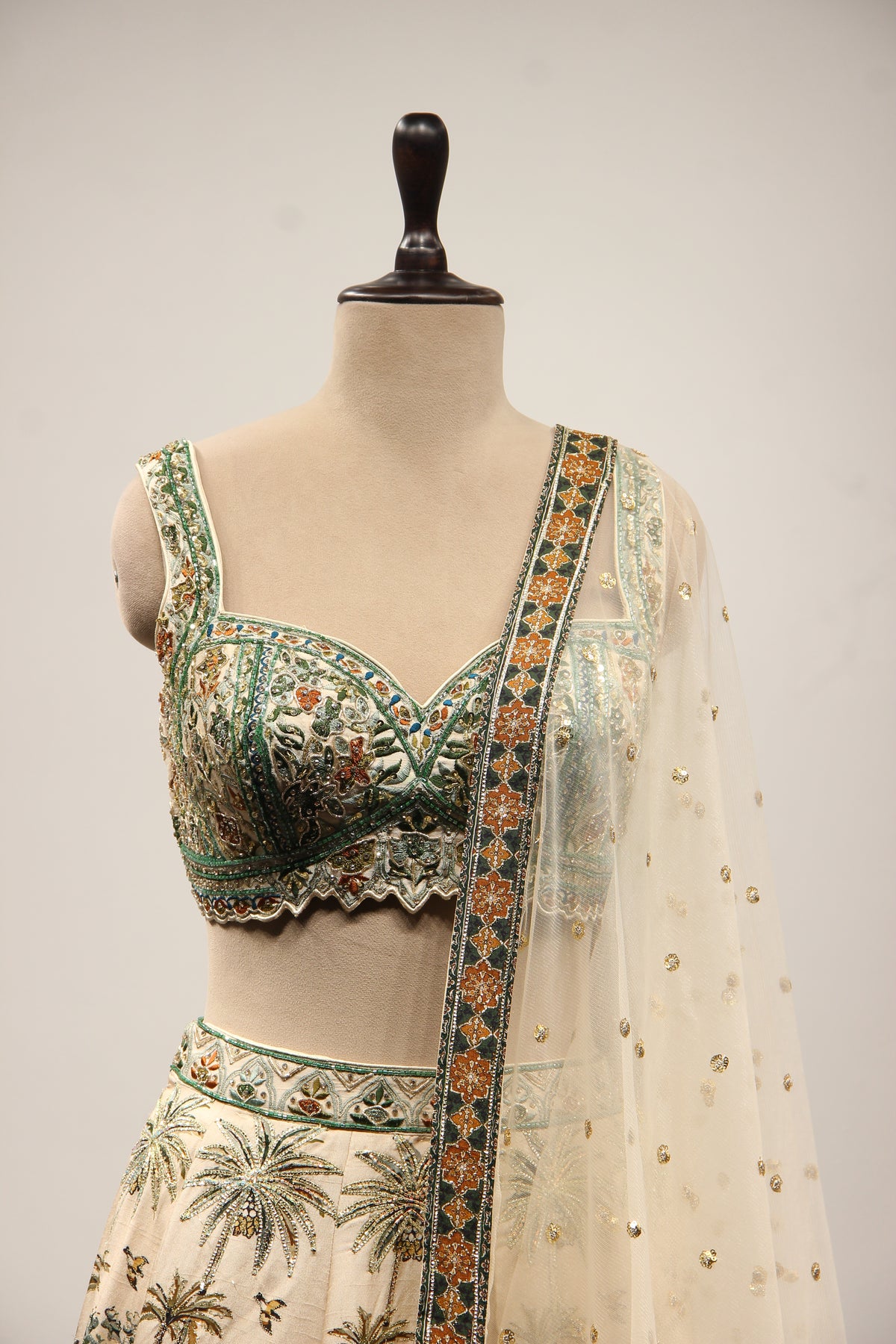 Beige Palm Printed Silk Lehenga with Hand Embroidery Crop Top – front close-up