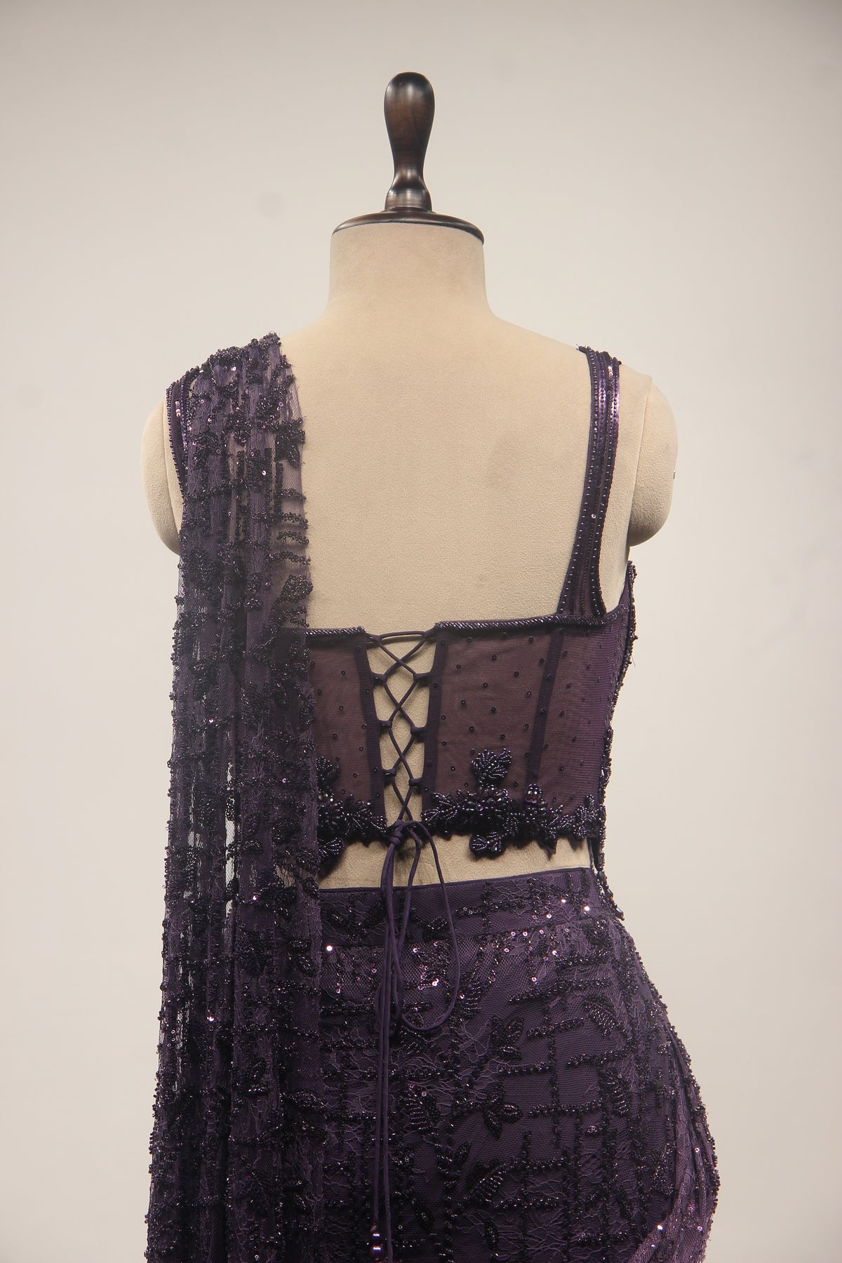 Imported Drape Saree with Cut Dana & Bead Handwork Net Corset Blouse in Purple – back close-up