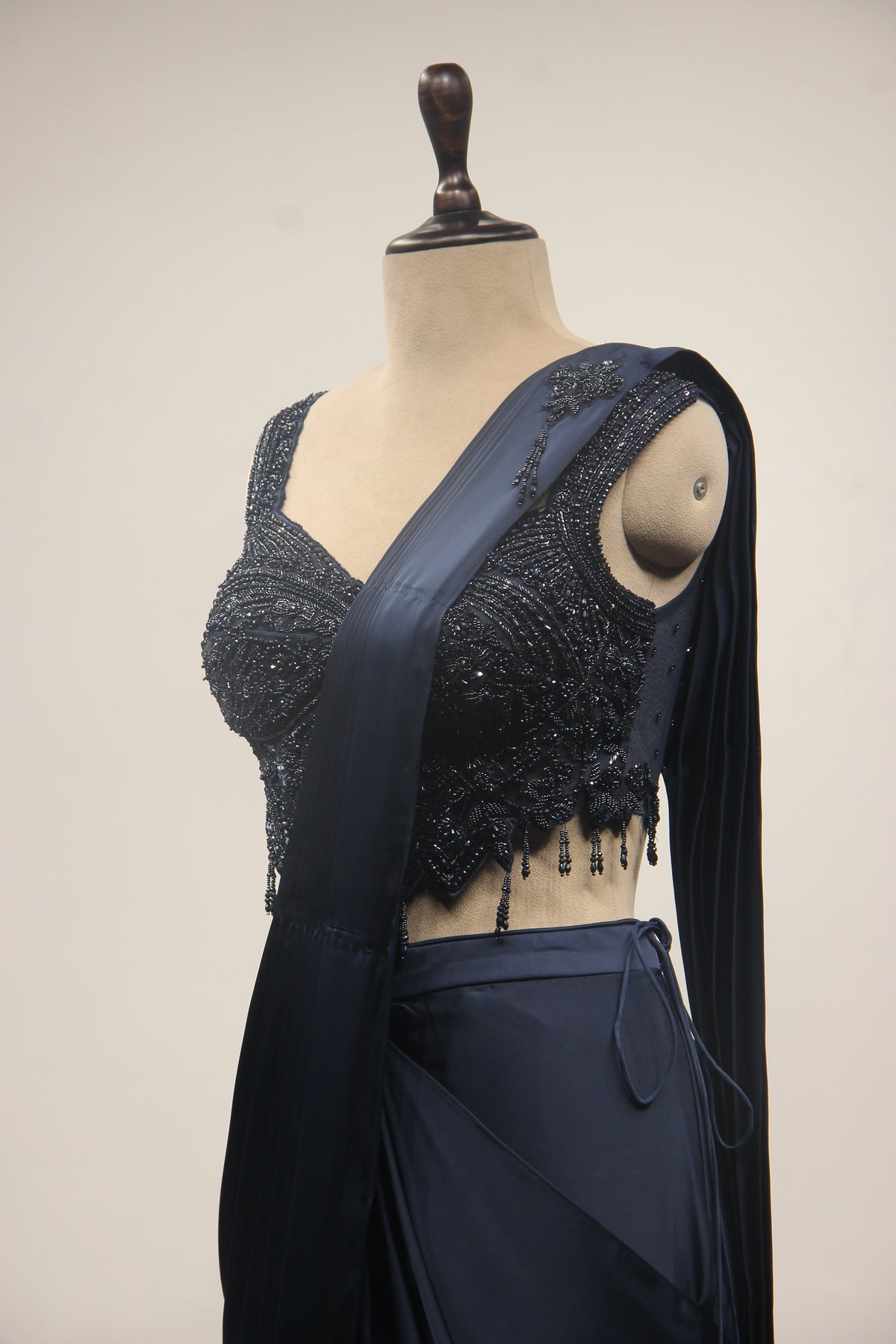 Satin Drape Saree with Beaded Net Corset in Cut Dana & Sequin Handwork in Blue – other side close-up