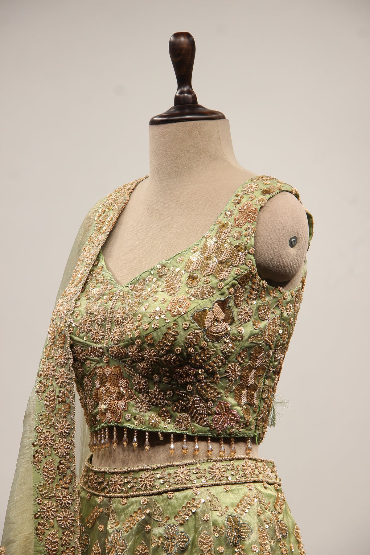 Green Shimmer Organza Lehenga with Bead & Zari Handwork Crop Top – other side close-up