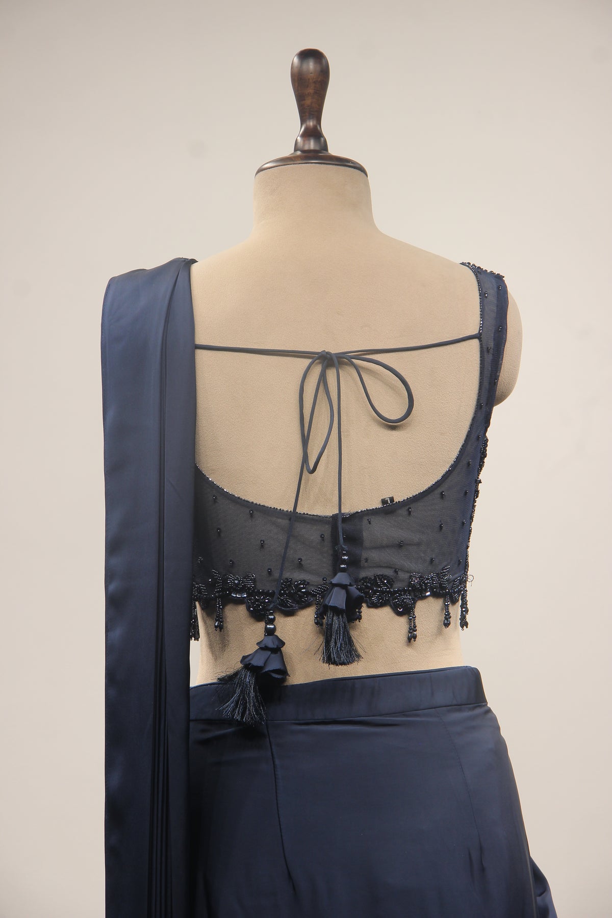 Satin Drape Saree with Beaded Net Corset in Cut Dana & Sequin Handwork in Blue – back close-up