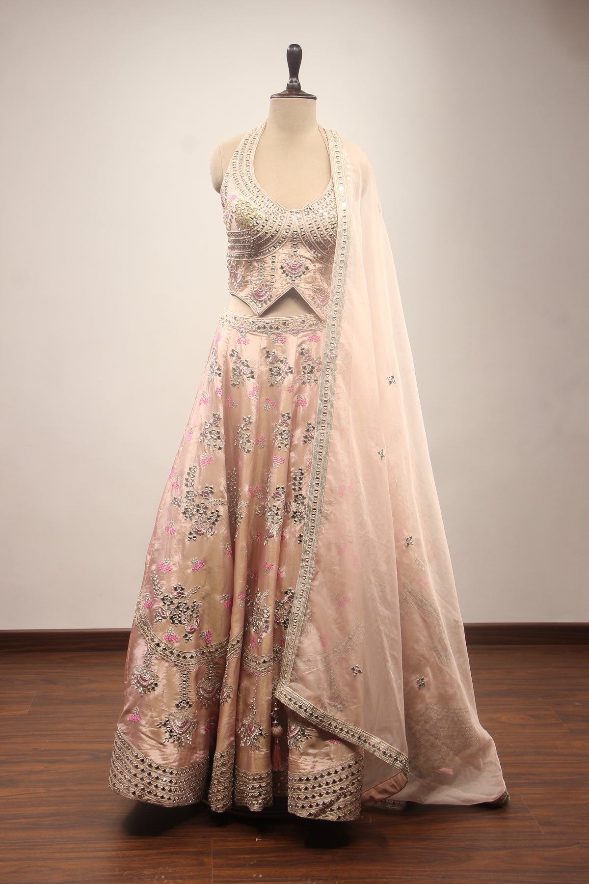 Baby Pink Tissue Lehenga with Mirror & Cut Dana Handwork Halter Corset – front view