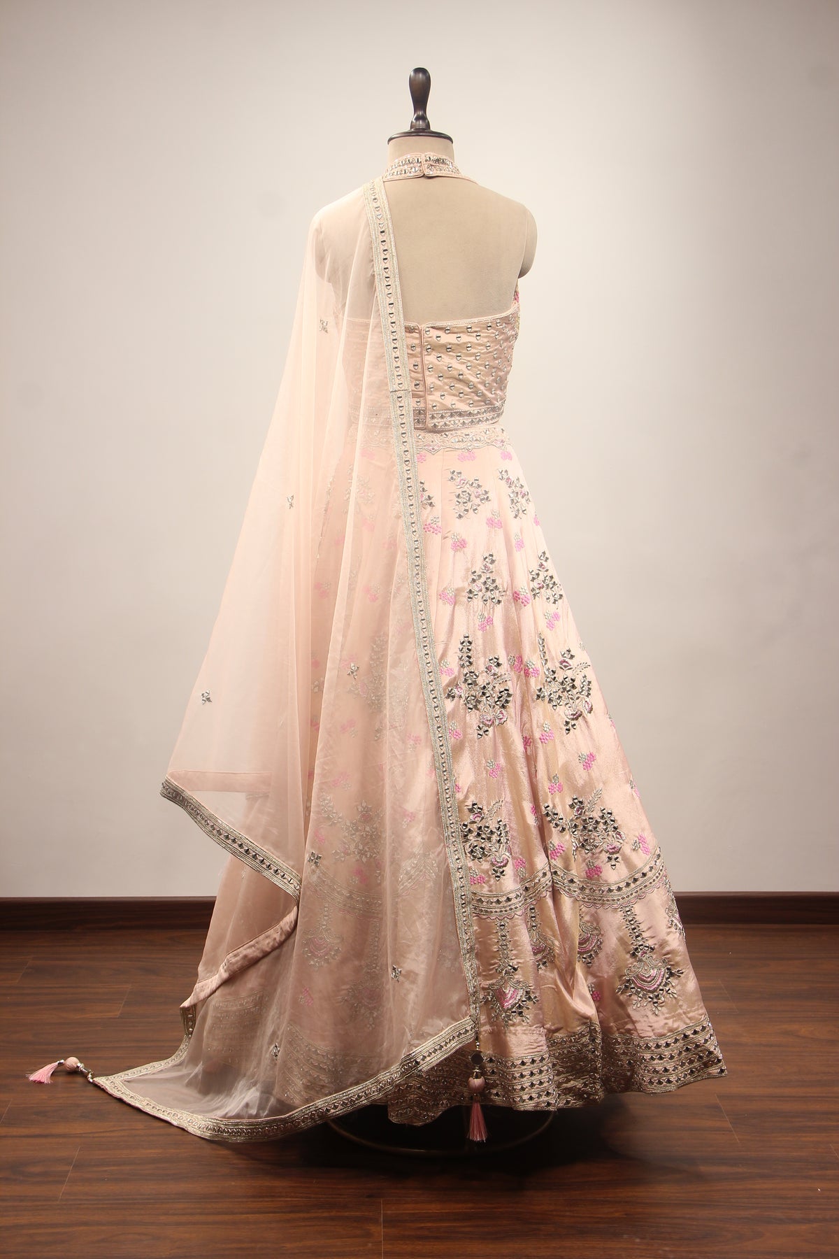 Baby Pink Tissue Lehenga with Mirror & Cut Dana Handwork Halter Corset – back view