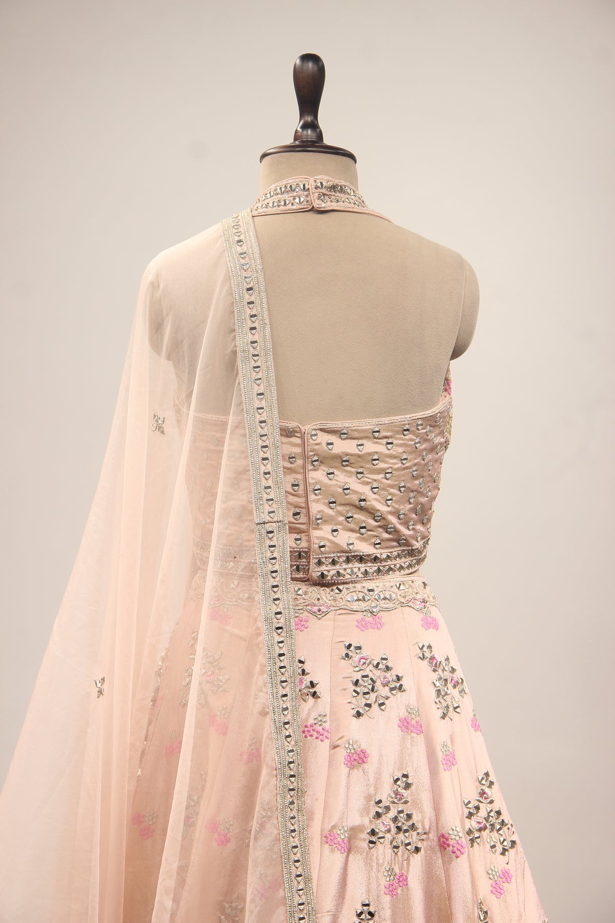 Baby Pink Tissue Lehenga with Mirror & Cut Dana Handwork Halter Corset – back close-up