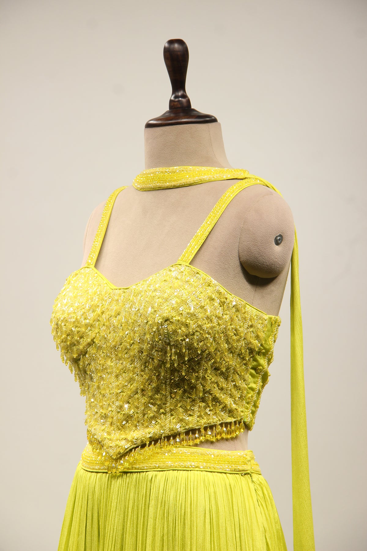 Crepe Lehenga with Sequin & Cut Dana Handwork Corset & Choker Dupatta in Green – side close-up
