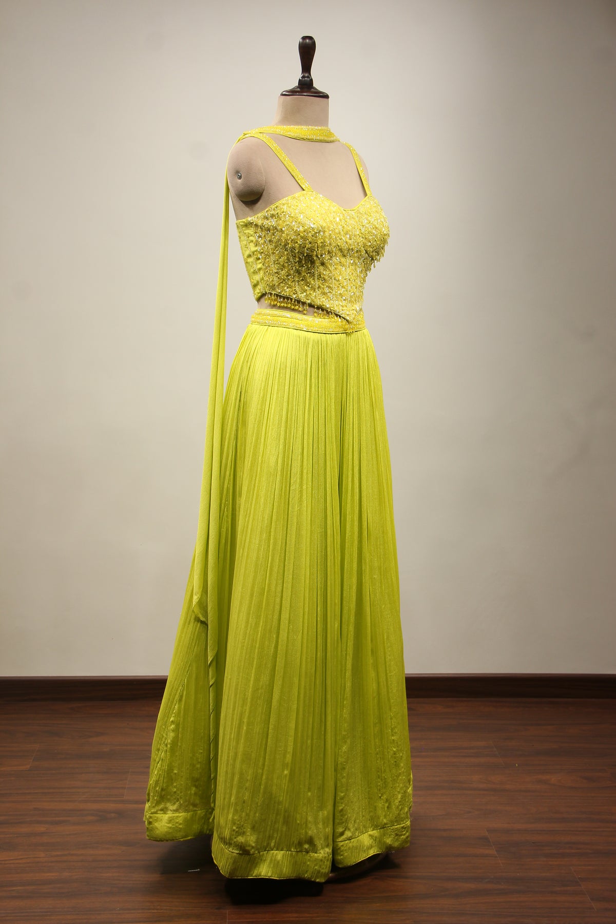 Crepe Lehenga with Sequin & Cut Dana Handwork Corset & Choker Dupatta in Green – other side view