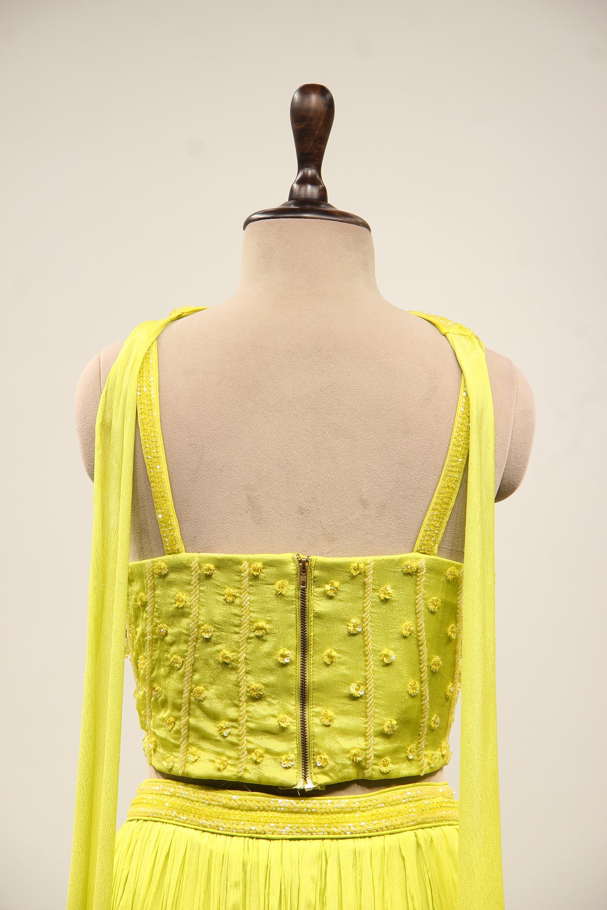 Crepe Lehenga with Sequin & Cut Dana Handwork Corset & Choker Dupatta in Green – back close-up