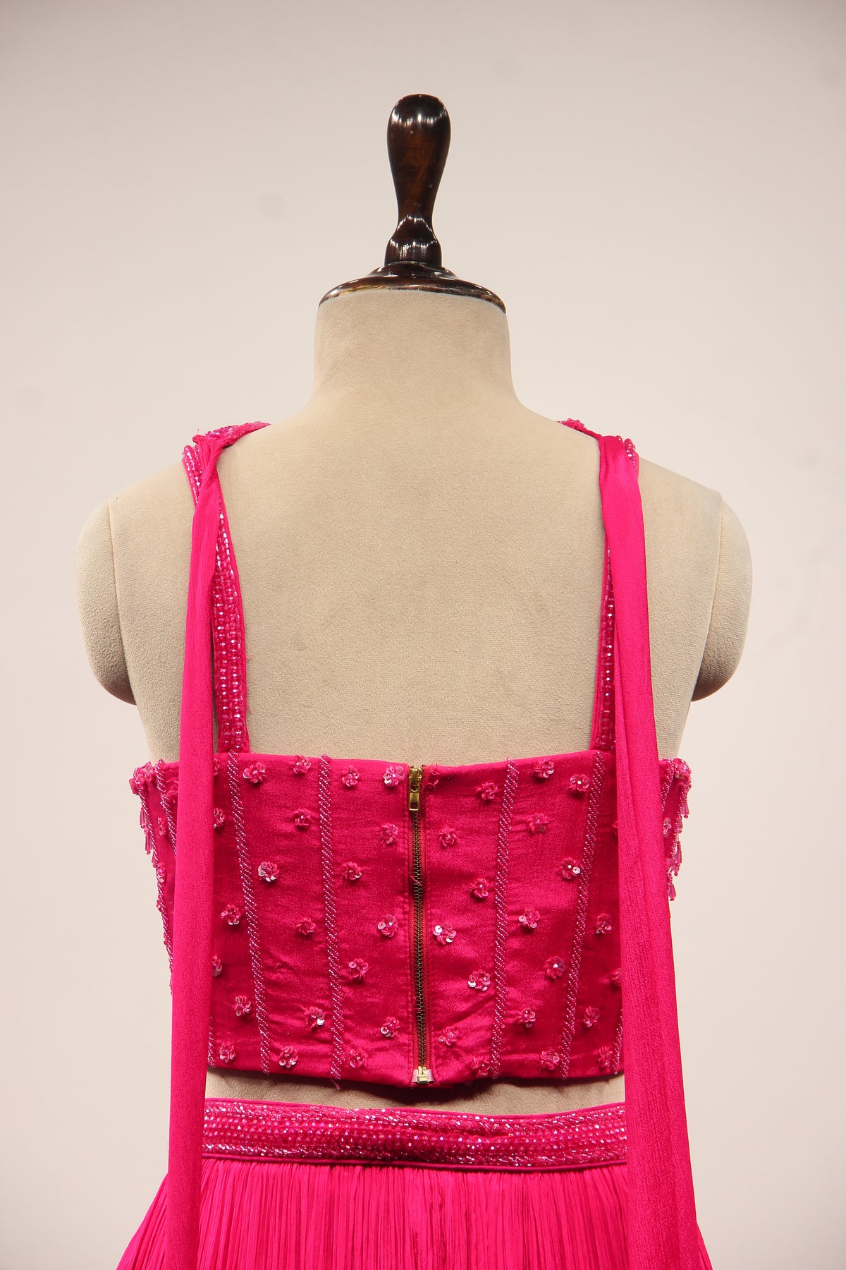 Crepe Lehenga with Sequin & Cut Dana Handwork Corset & Choker Dupatta in Pink – back close-up