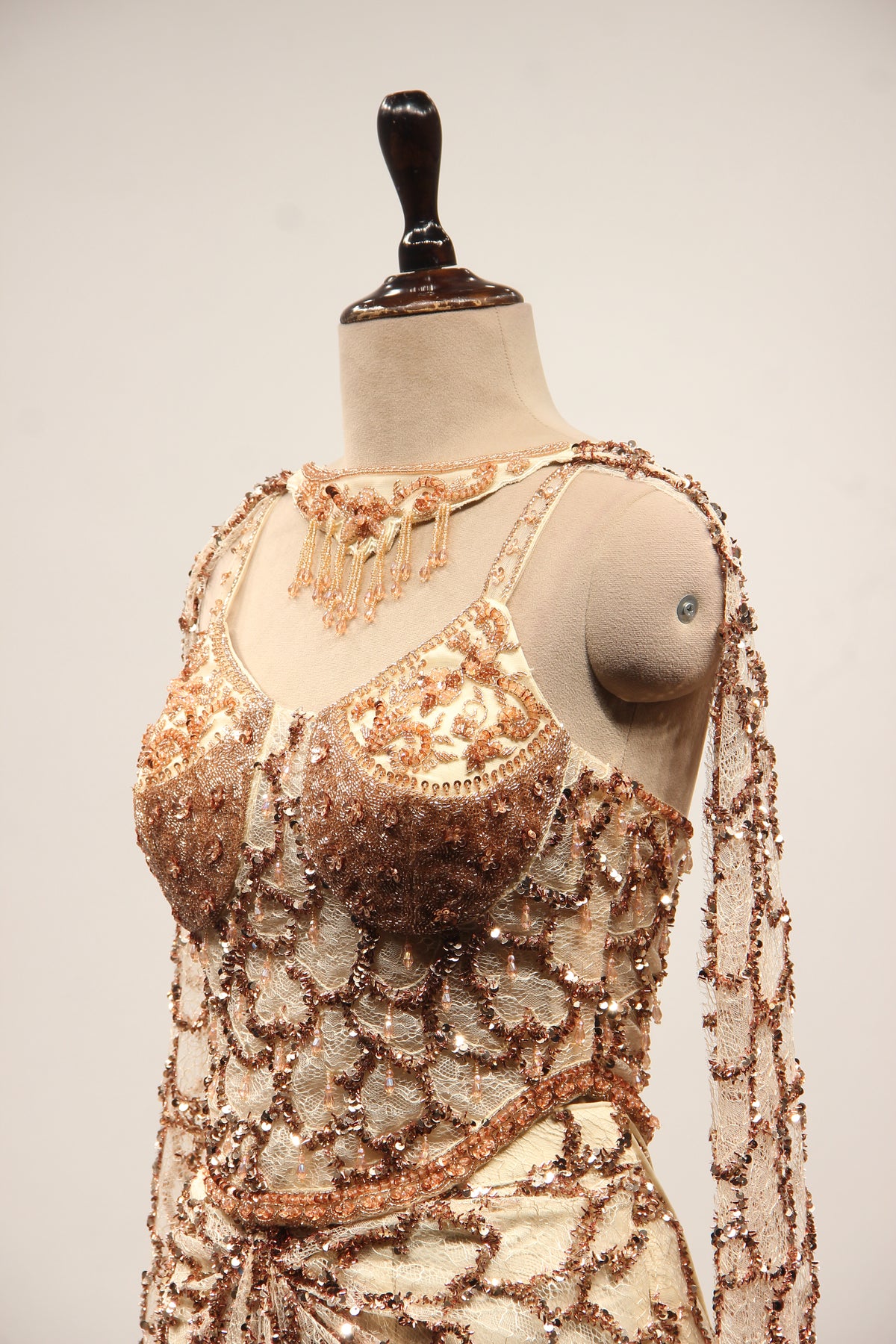 Imported Indo Western Net Corset Set with Sequin & Cut Dana Handwork in Gold – side close-up
