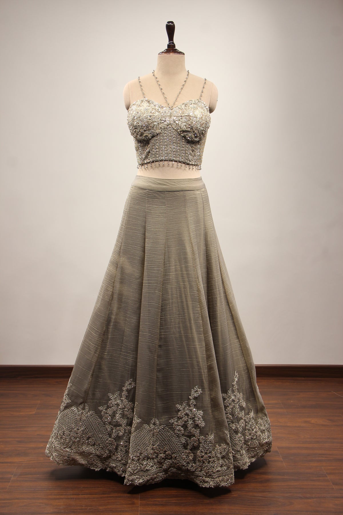 Grey Tissue Corset Lehenga with Sequin & Stone Handwork and Net Shrug – front view, without shrug