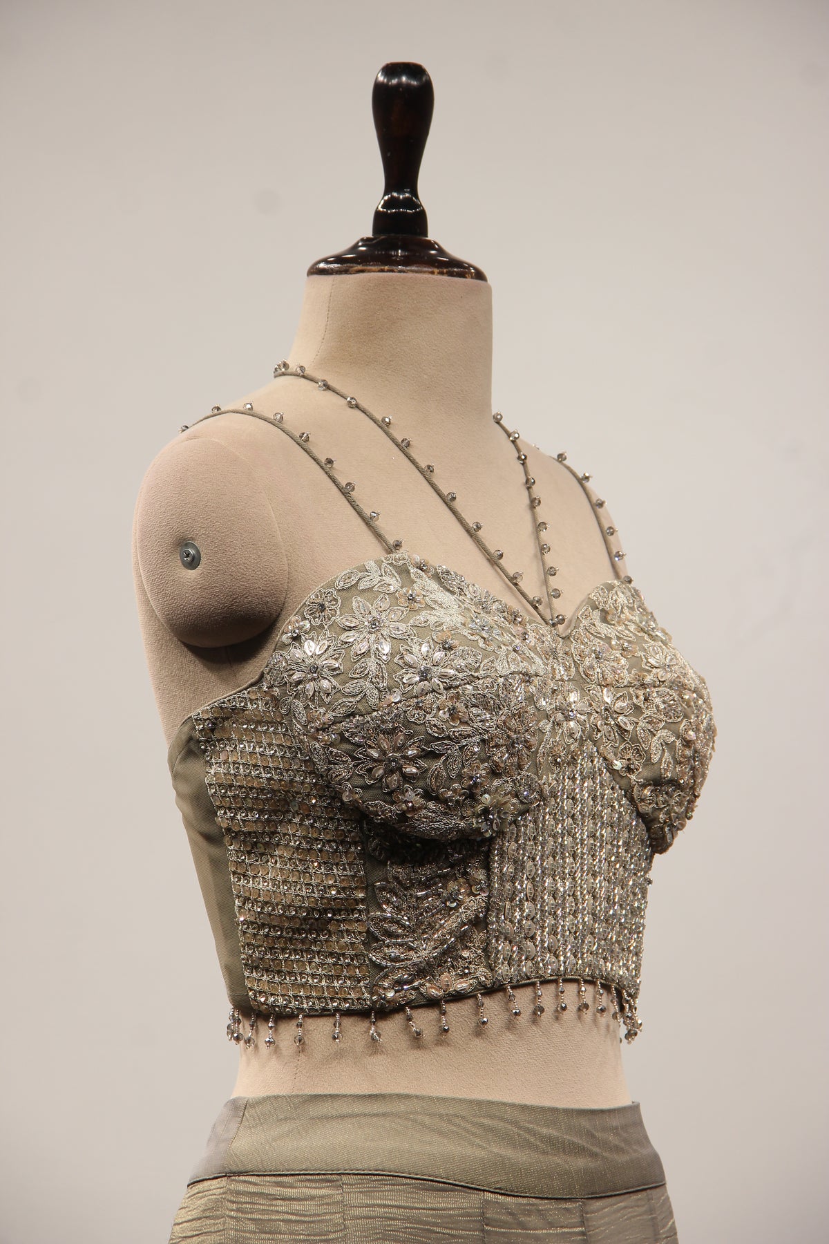Grey Tissue Corset Lehenga with Sequin & Stone Handwork and Net Shrug – other side close-up, without shrug