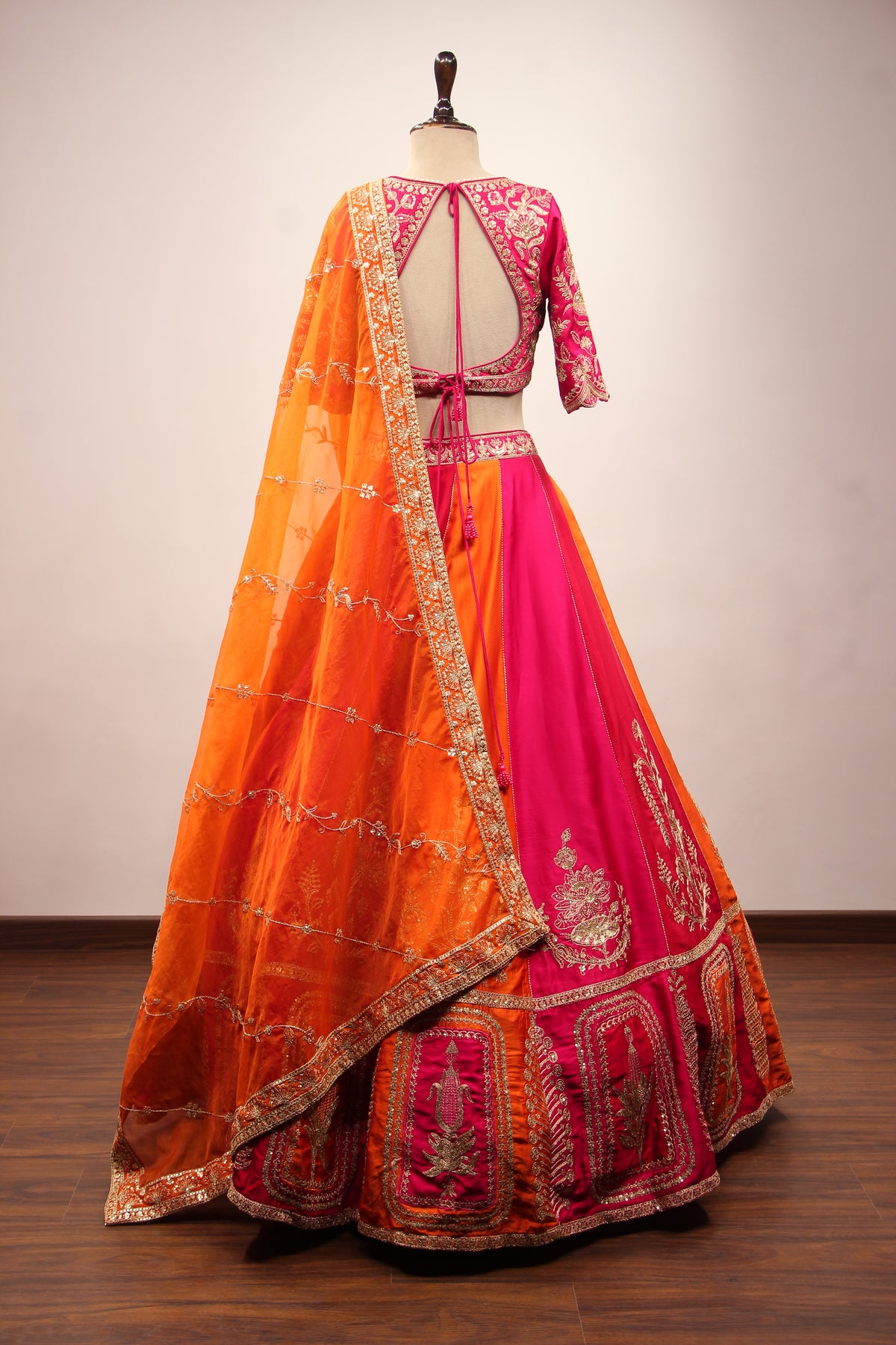 Orange Silk Panelled Lehenga with Zari & Sequin Handwork Crop Top – back view
